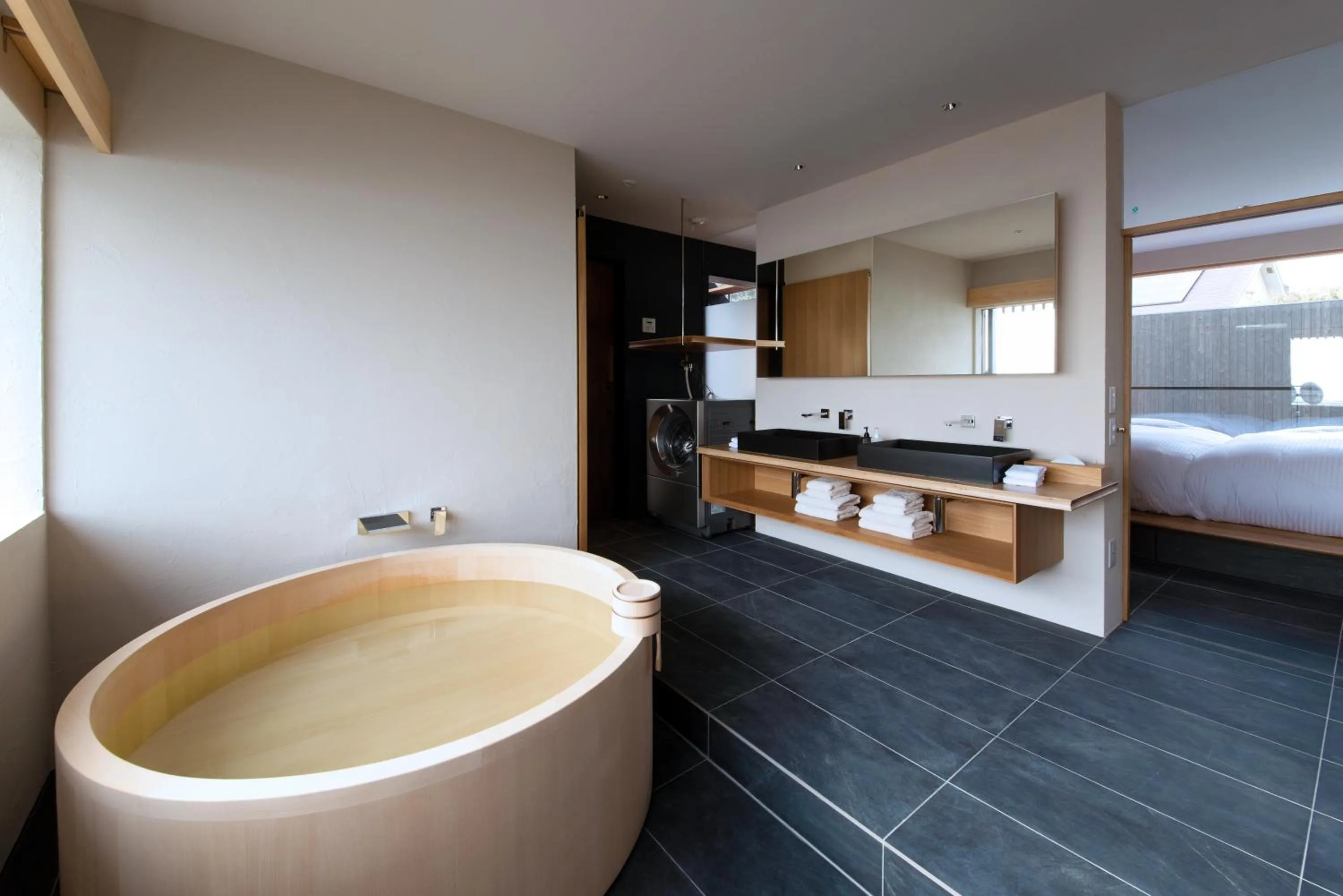 Bathroom, Bed in modern ryokan kishi-ke