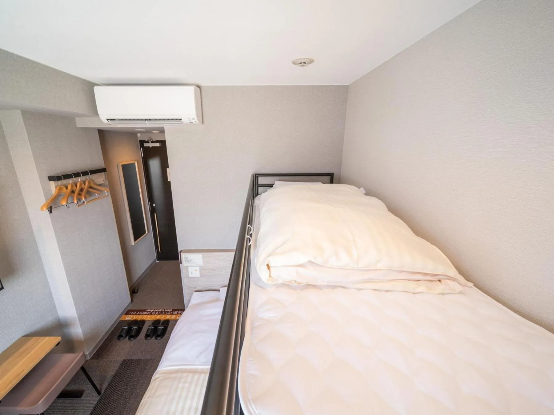 Bed in Super Hotel Premier Obihiro Ekimae