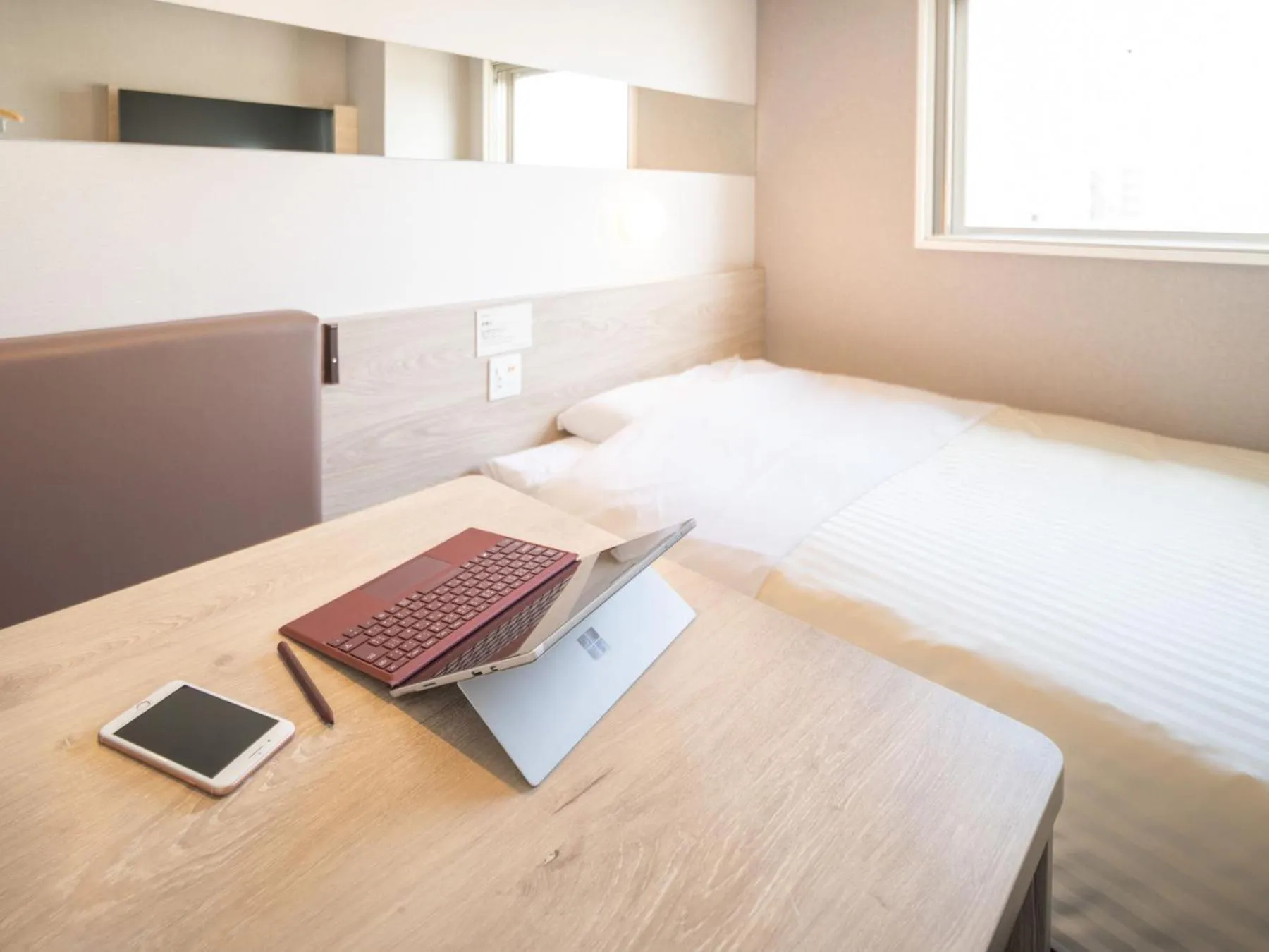 Bed in Super Hotel Premier Obihiro Ekimae