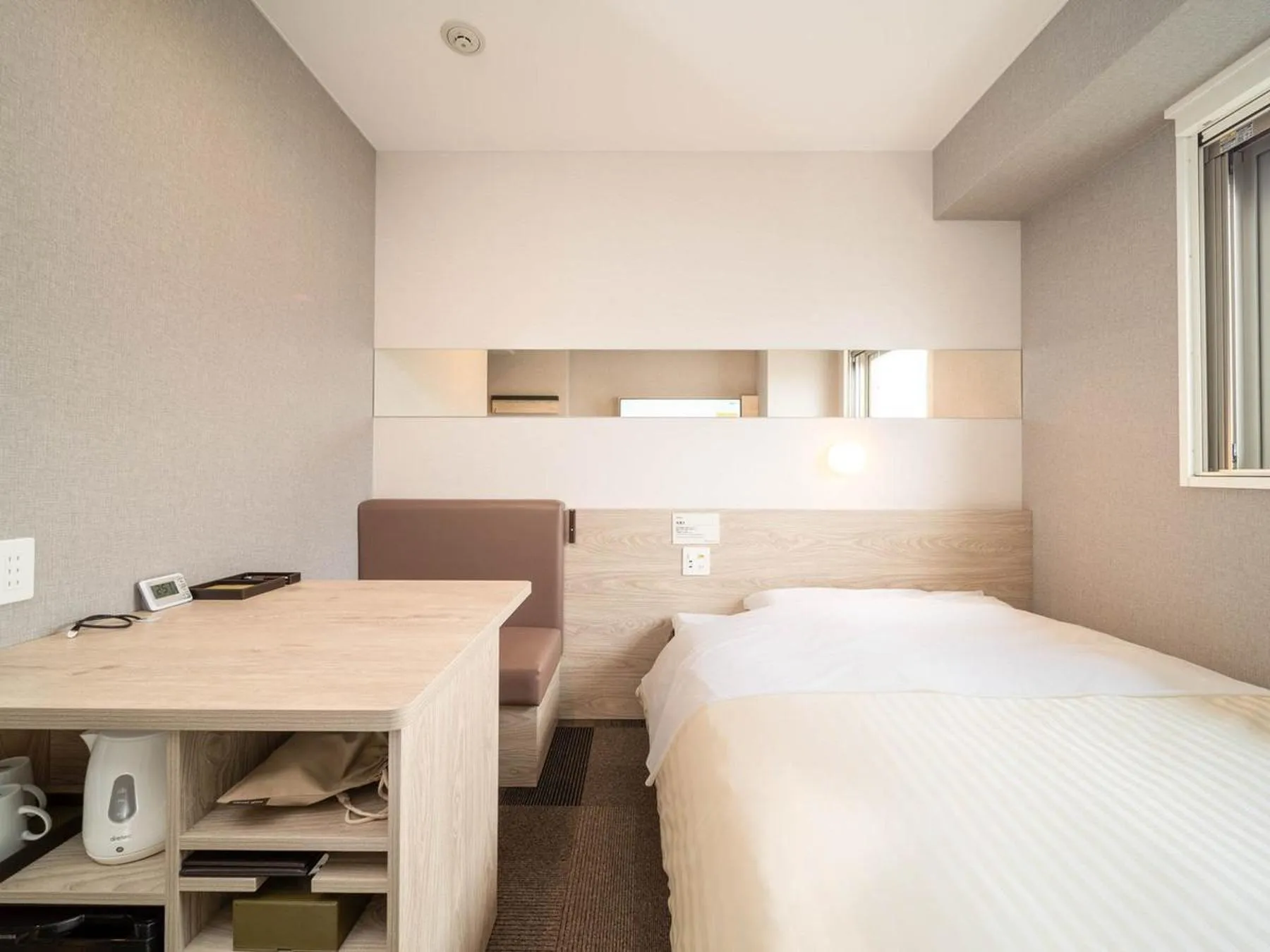 Bed in Super Hotel Premier Obihiro Ekimae