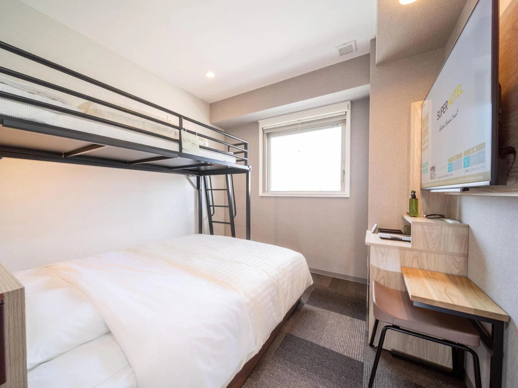 Photo of the whole room, Bed in Super Hotel Premier Obihiro Ekimae