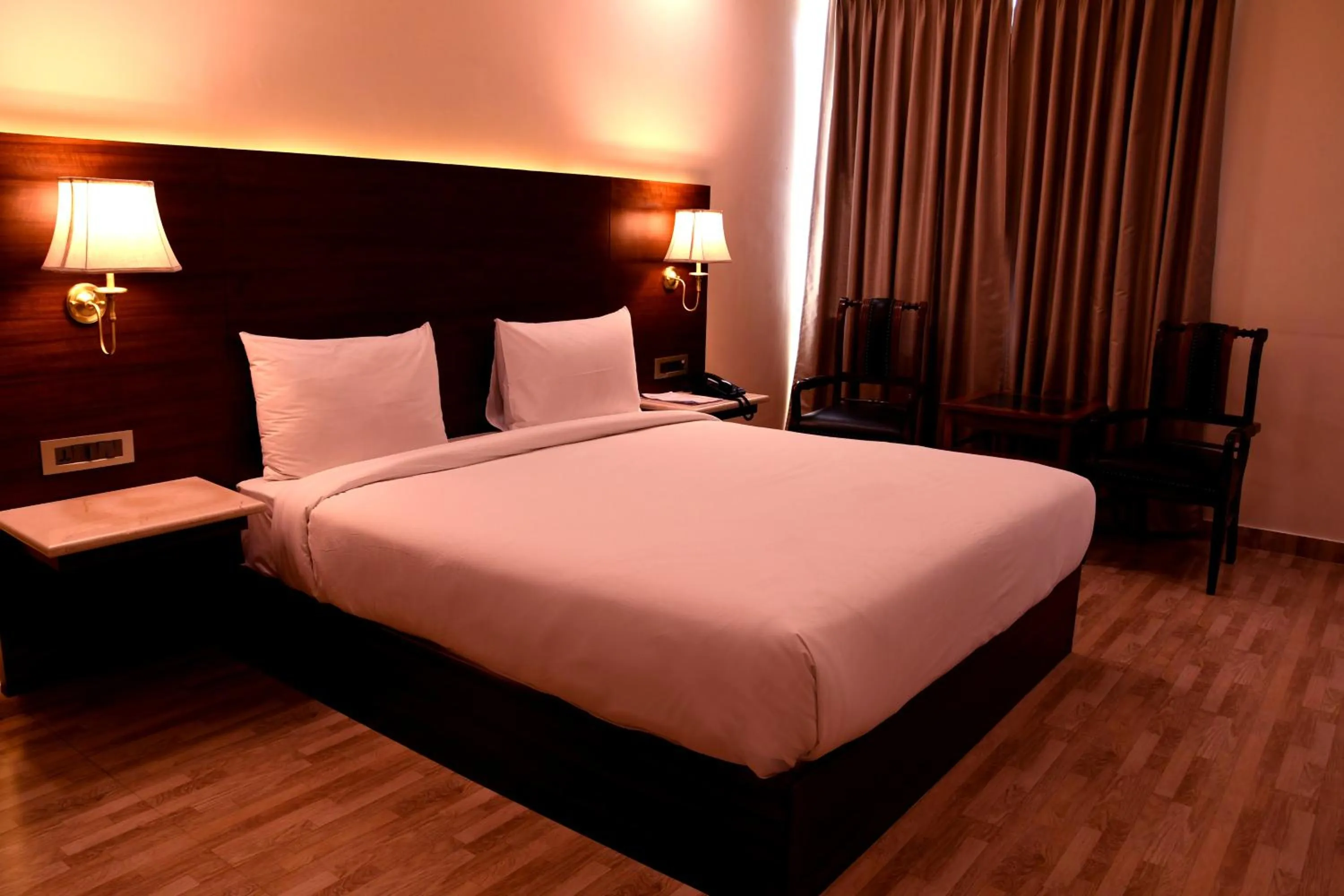 Photo of the whole room, Bed in Mastiff Villa Camellia by OTHPL