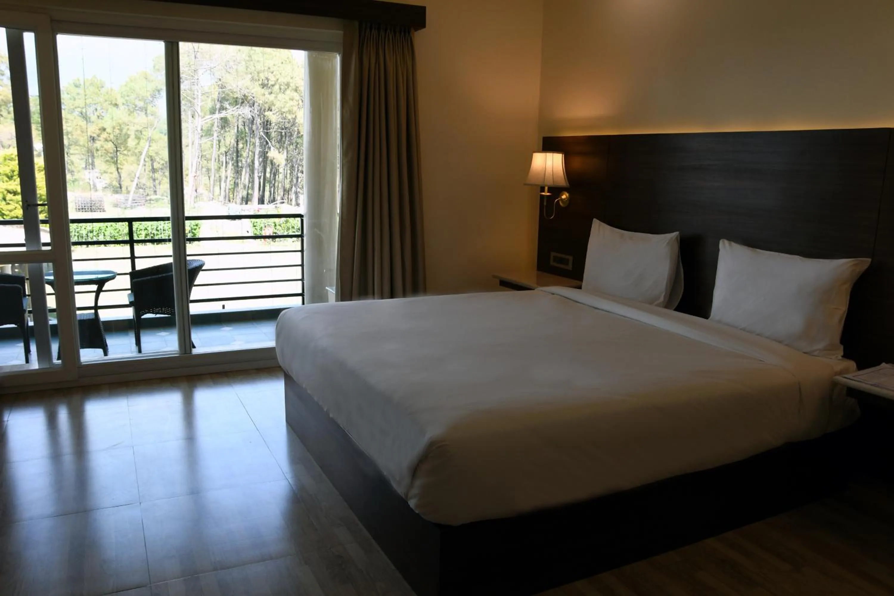 Photo of the whole room, Bed in Mastiff Villa Camellia by OTHPL