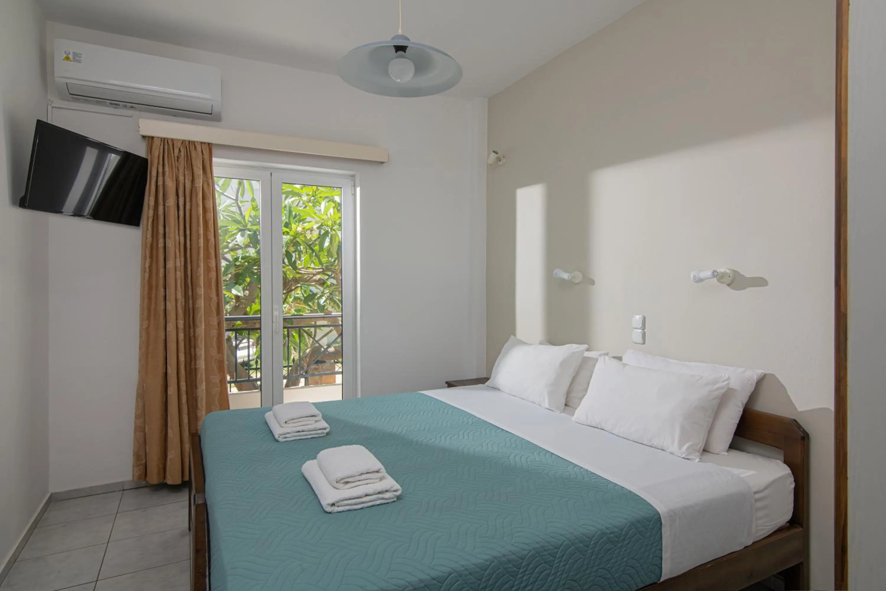 Bedroom in Litsa Mare Apartments