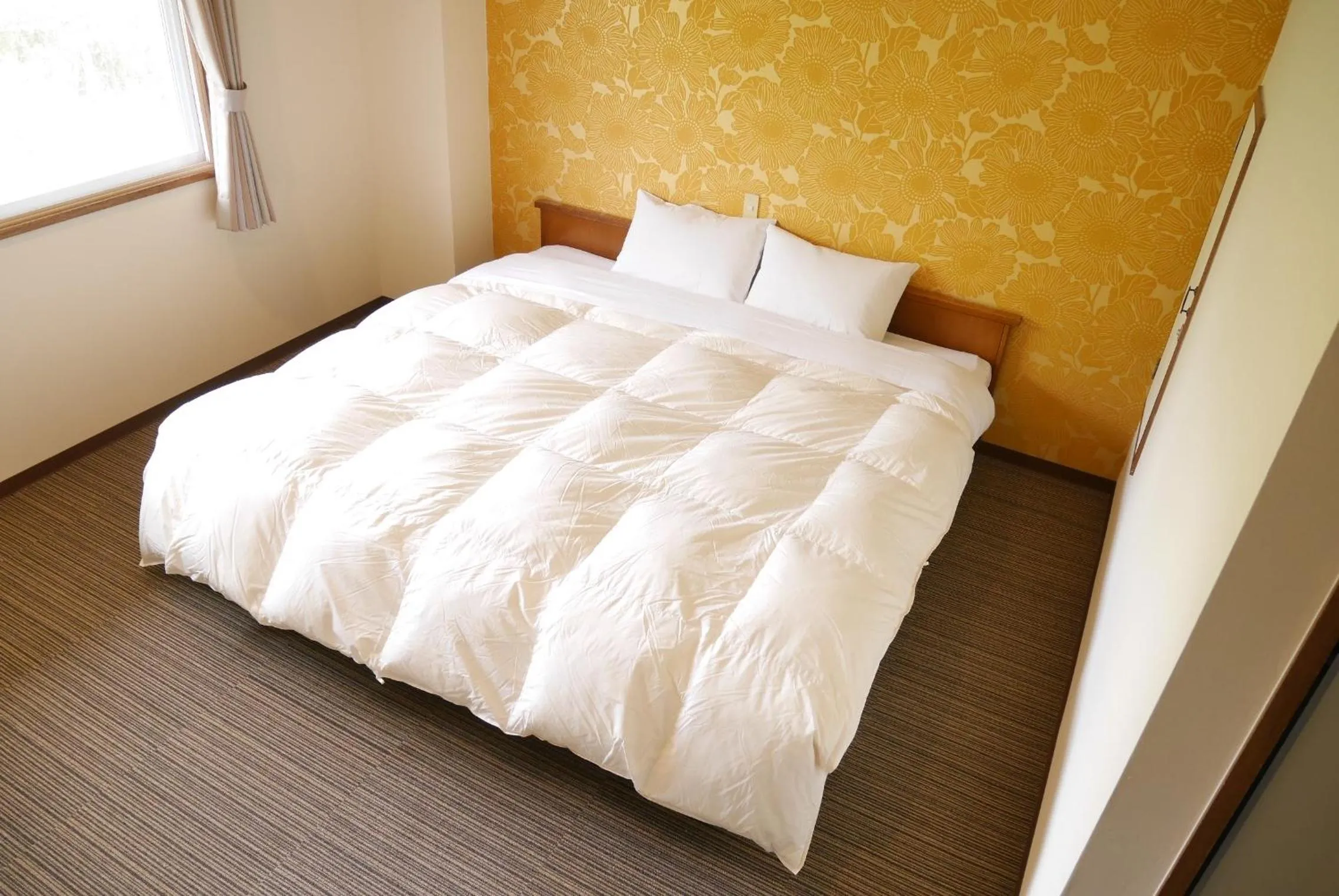 Photo of the whole room, Bed in K's House Hokkaido - Asahidake Onsen Hostel