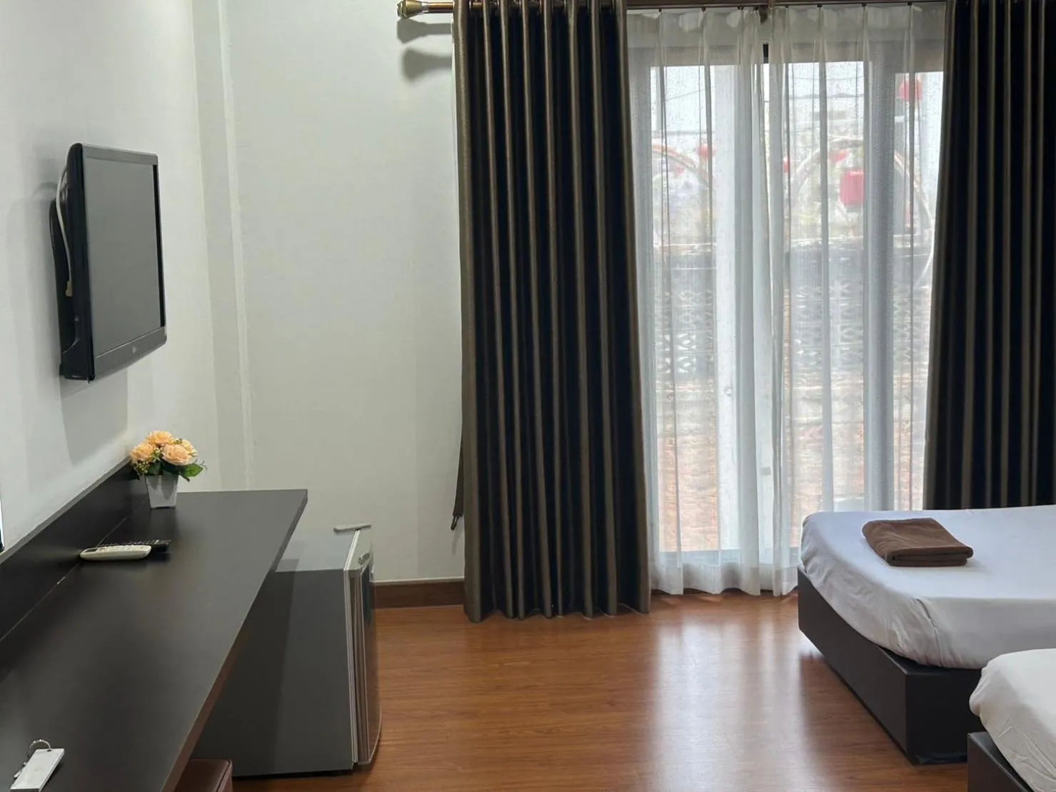 Communal lounge/ TV room, Bed in Bordin Hotel