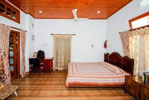 Bed in Madhumita Homestay