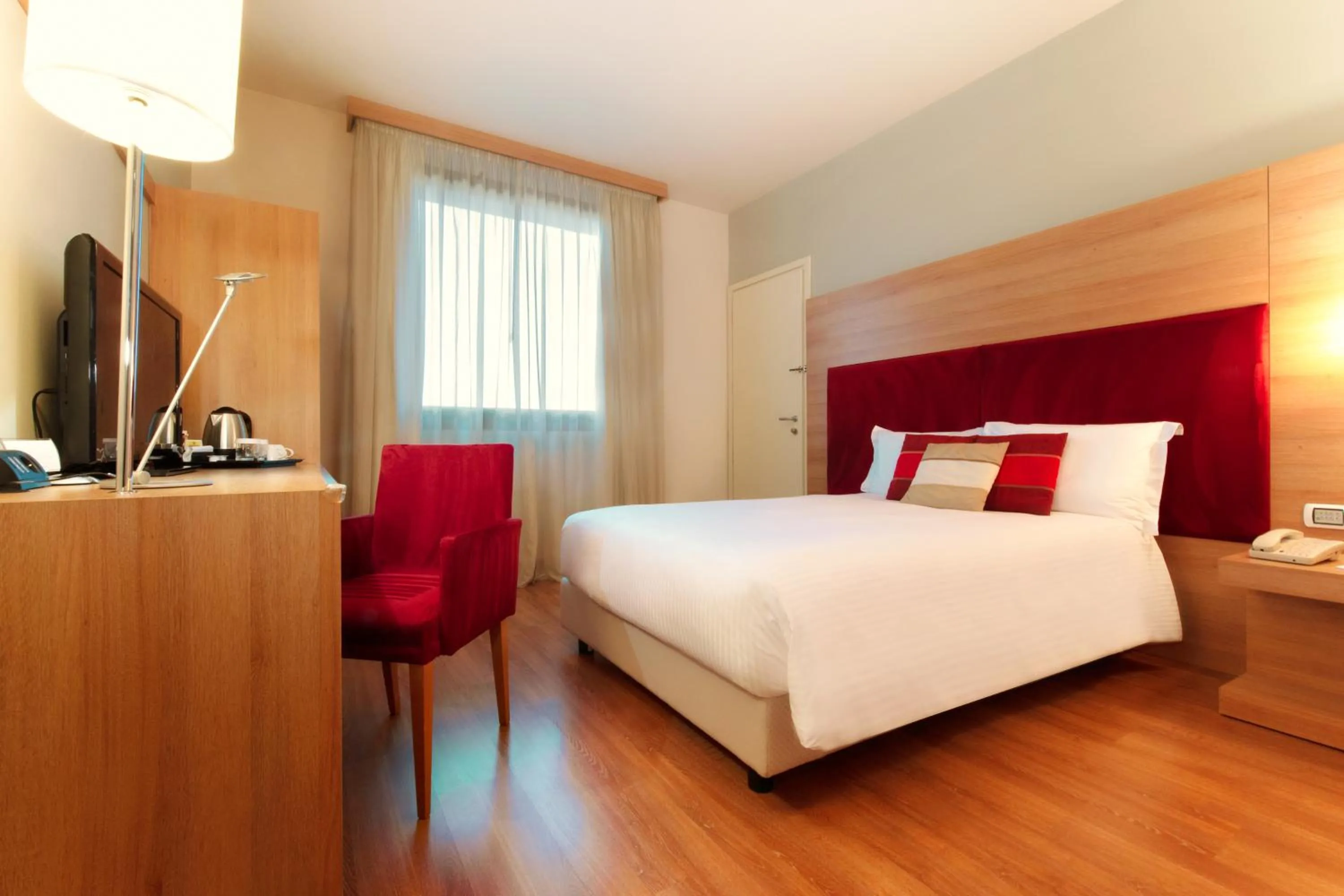 Bed in Zeus Essence Dolce by Wyndham Milan Malpensa