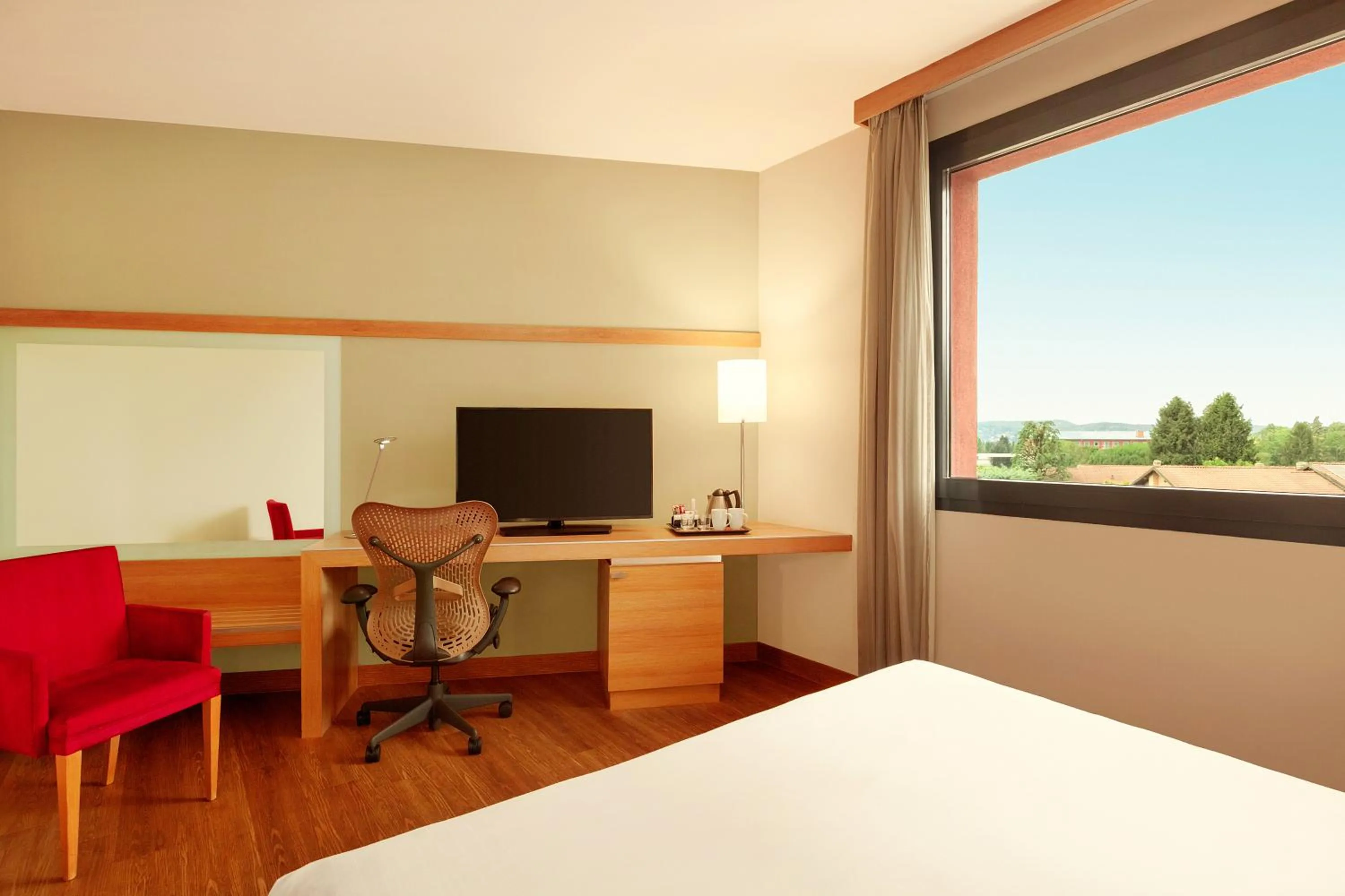 Bed in Zeus Essence Dolce by Wyndham Milan Malpensa