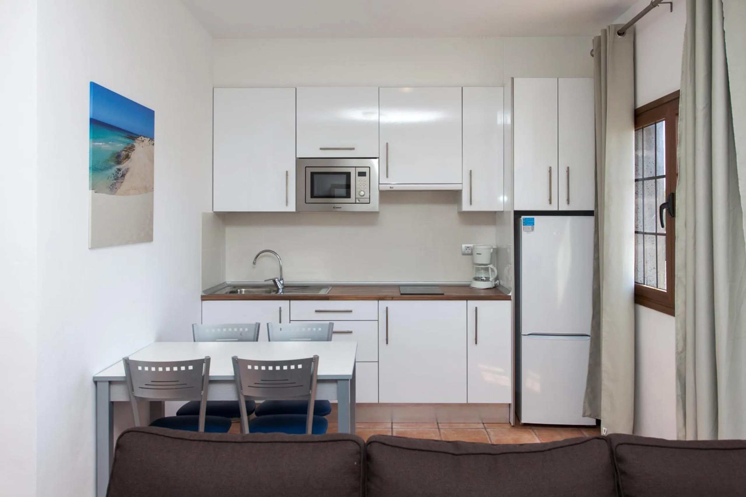 Kitchen or kitchenette in Villas & Apartamentos Tao Mazo