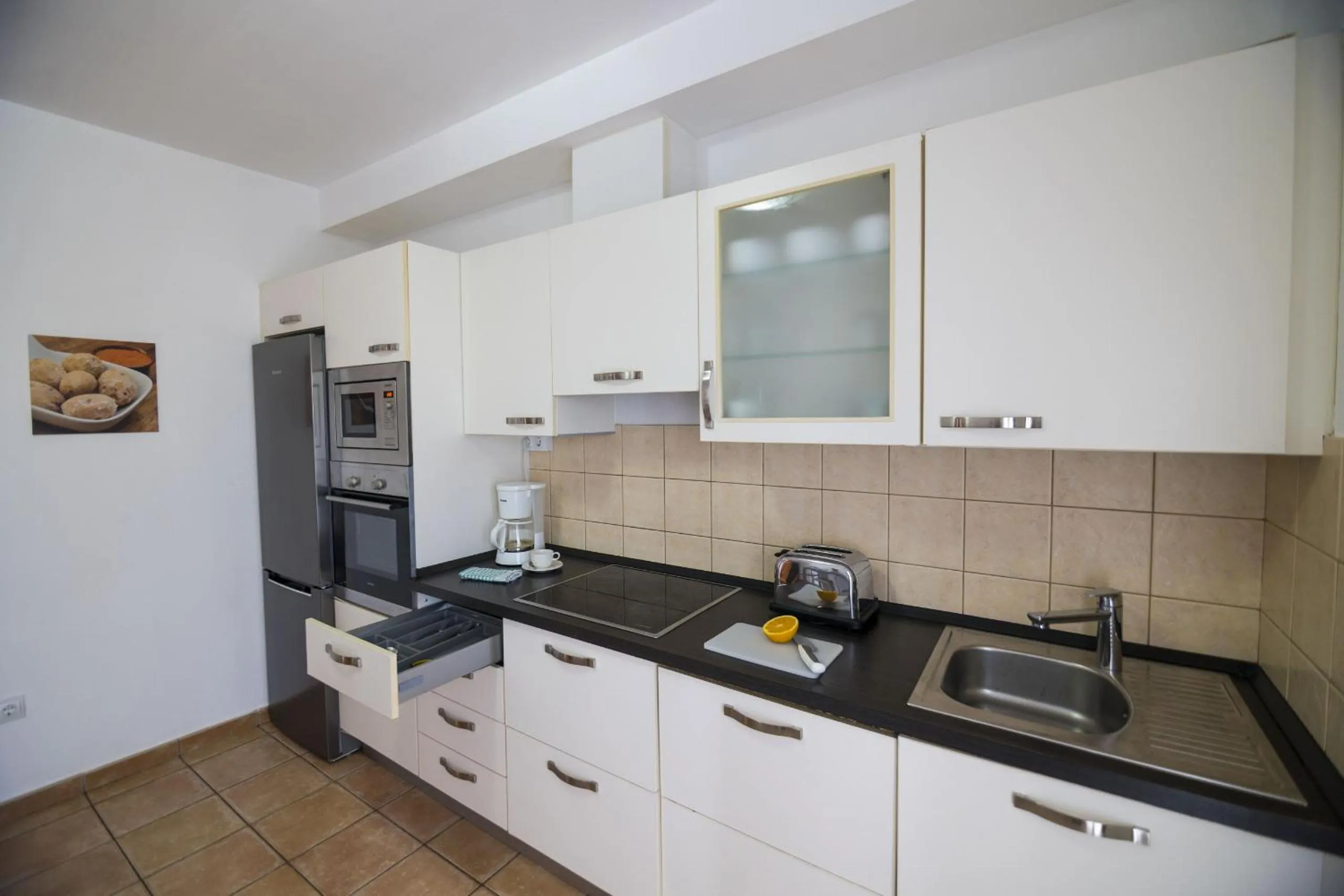 Kitchen or kitchenette in Villas & Apartamentos Tao Mazo