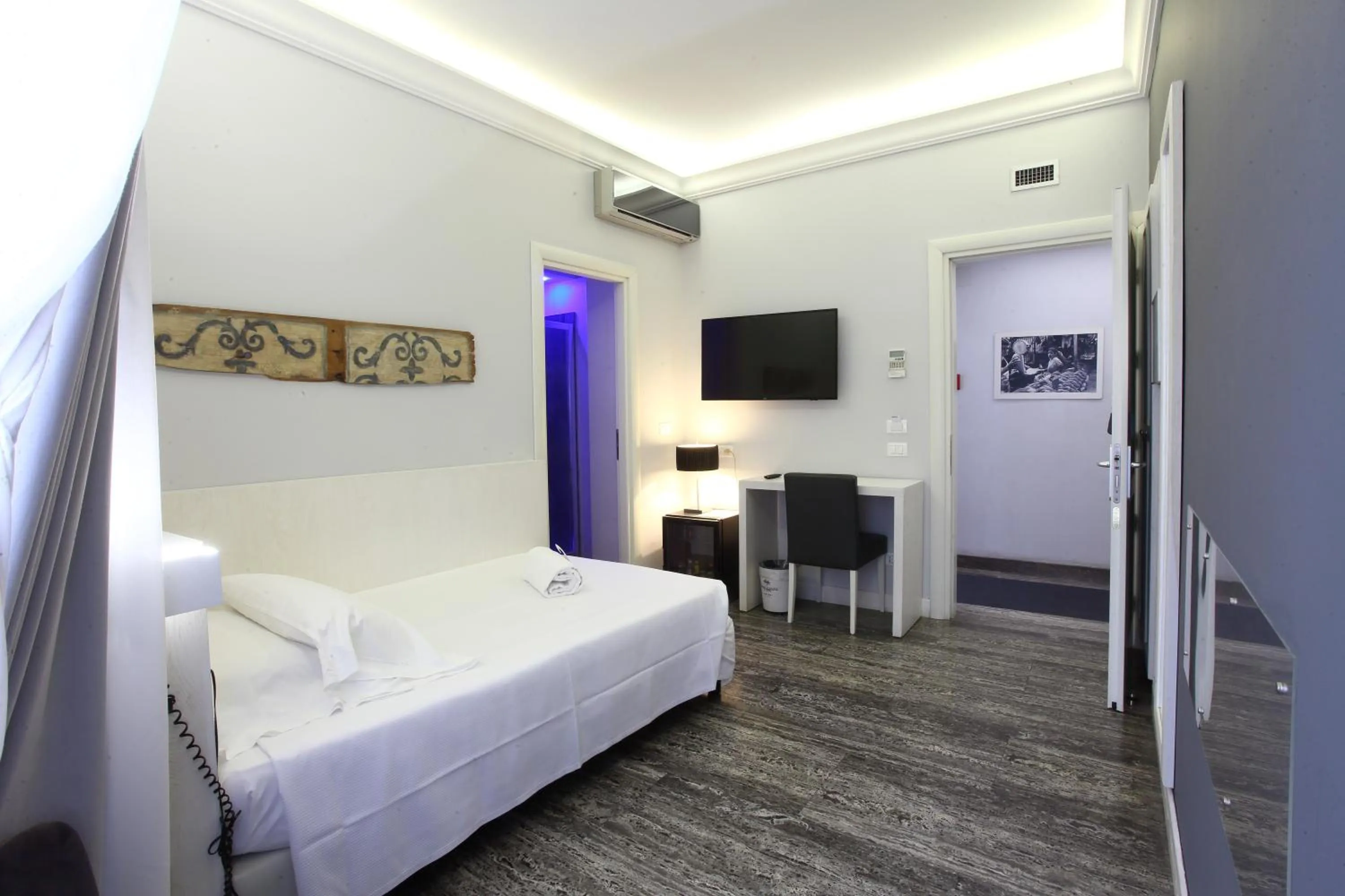 Bed in Quintocanto Hotel & Spa