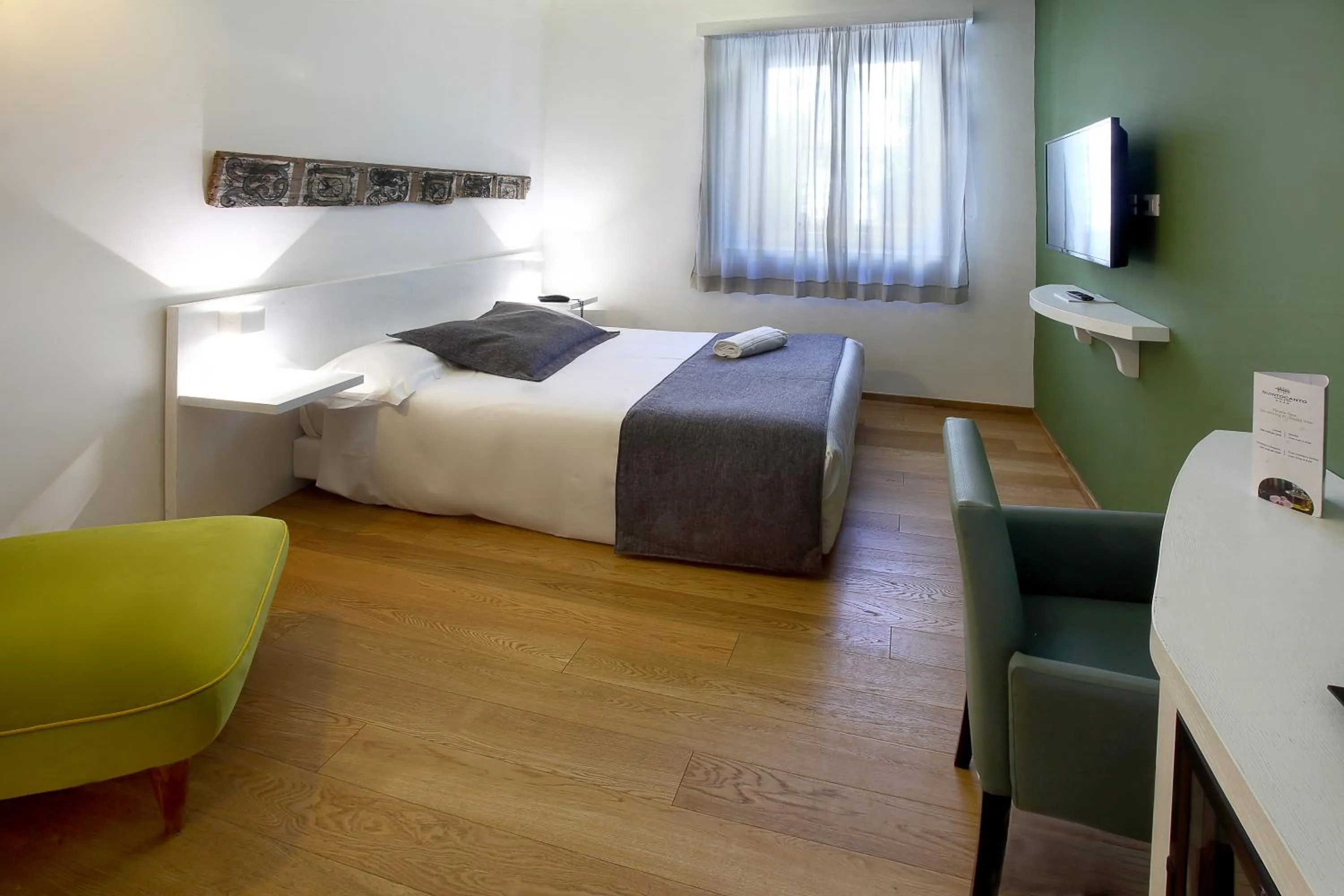 Bed in Quintocanto Hotel & Spa