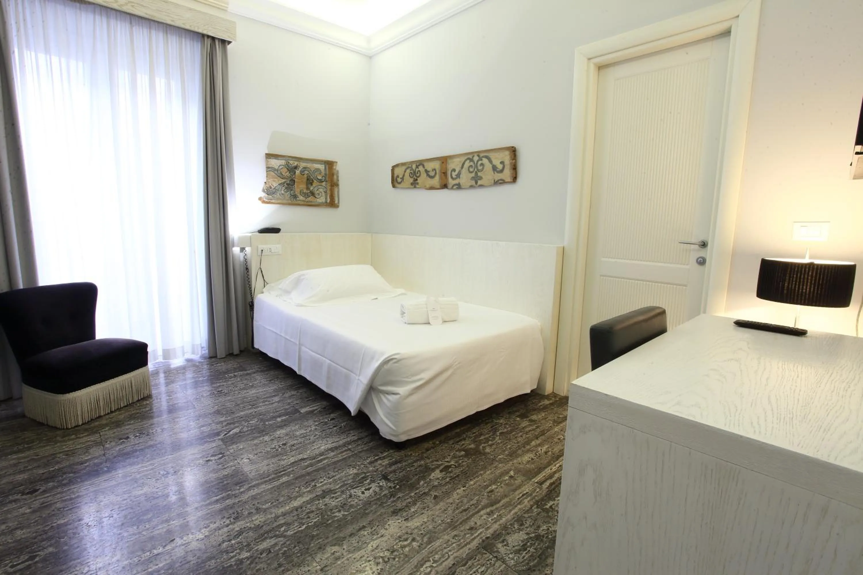 Bed in Quintocanto Hotel & Spa