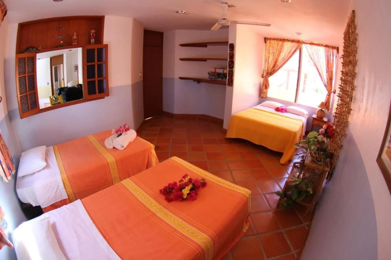 Bed in Hotel Villa Tropical