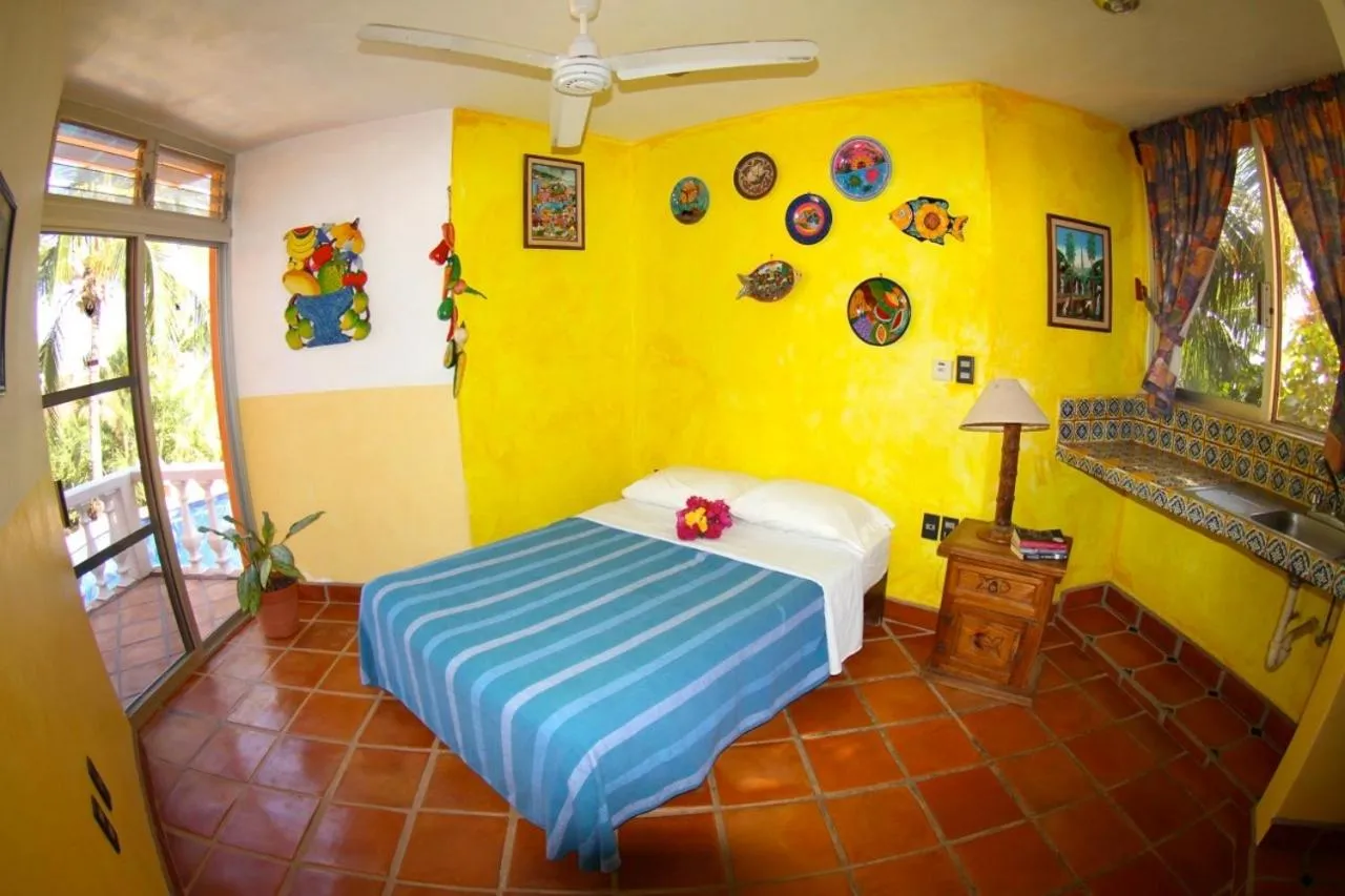 Bed in Hotel Villa Tropical