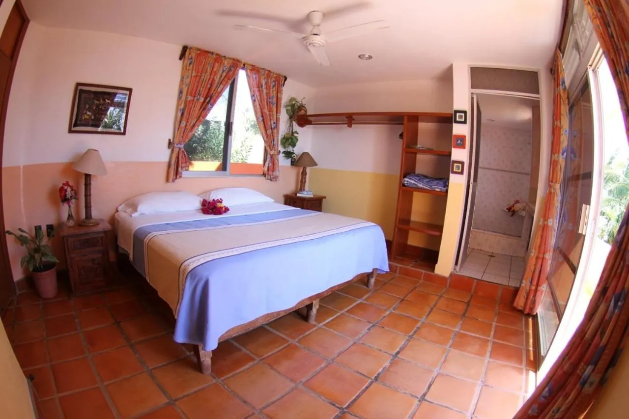 Bed in Hotel Villa Tropical