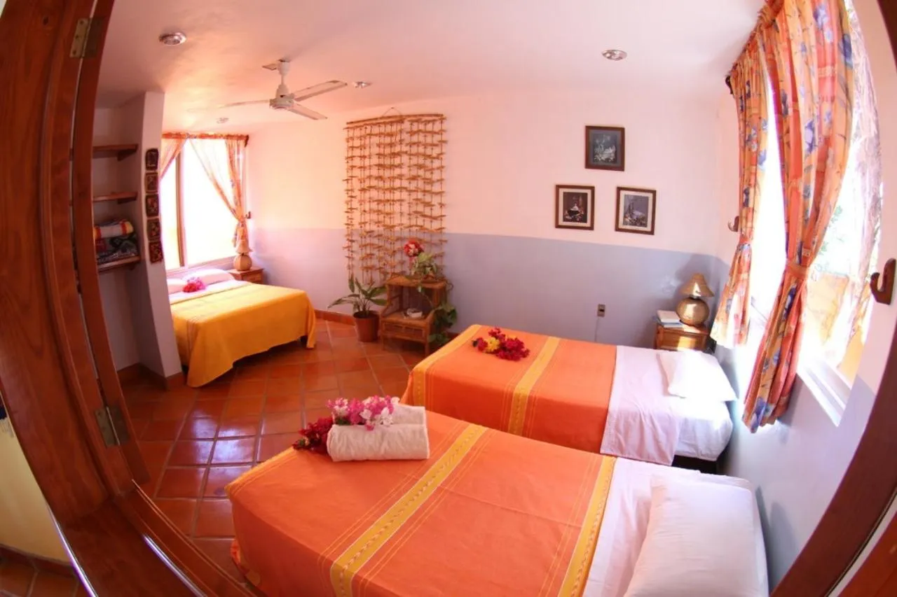 Bed in Hotel Villa Tropical