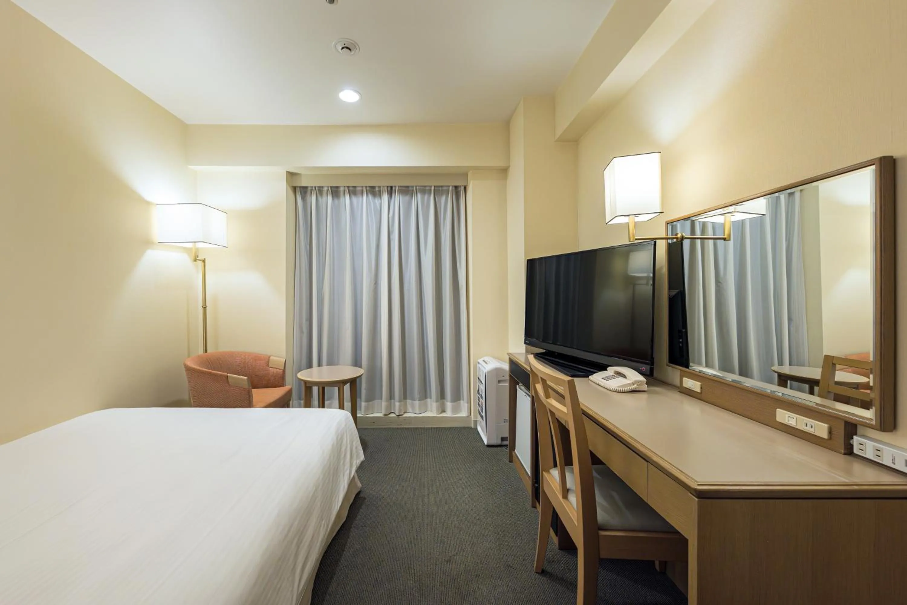 Bed in Hotel JAL City Nagano