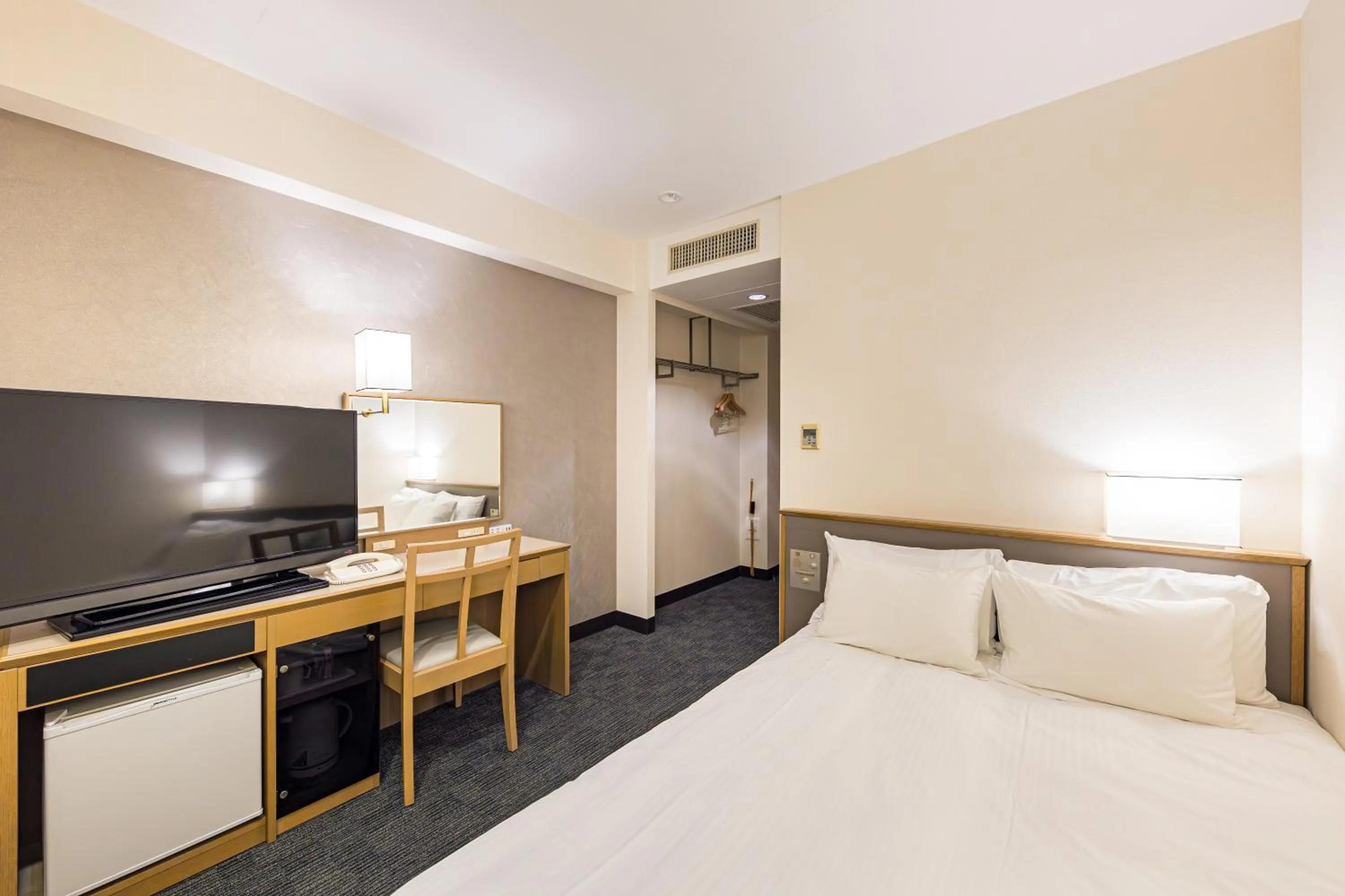 Bed in Hotel JAL City Nagano