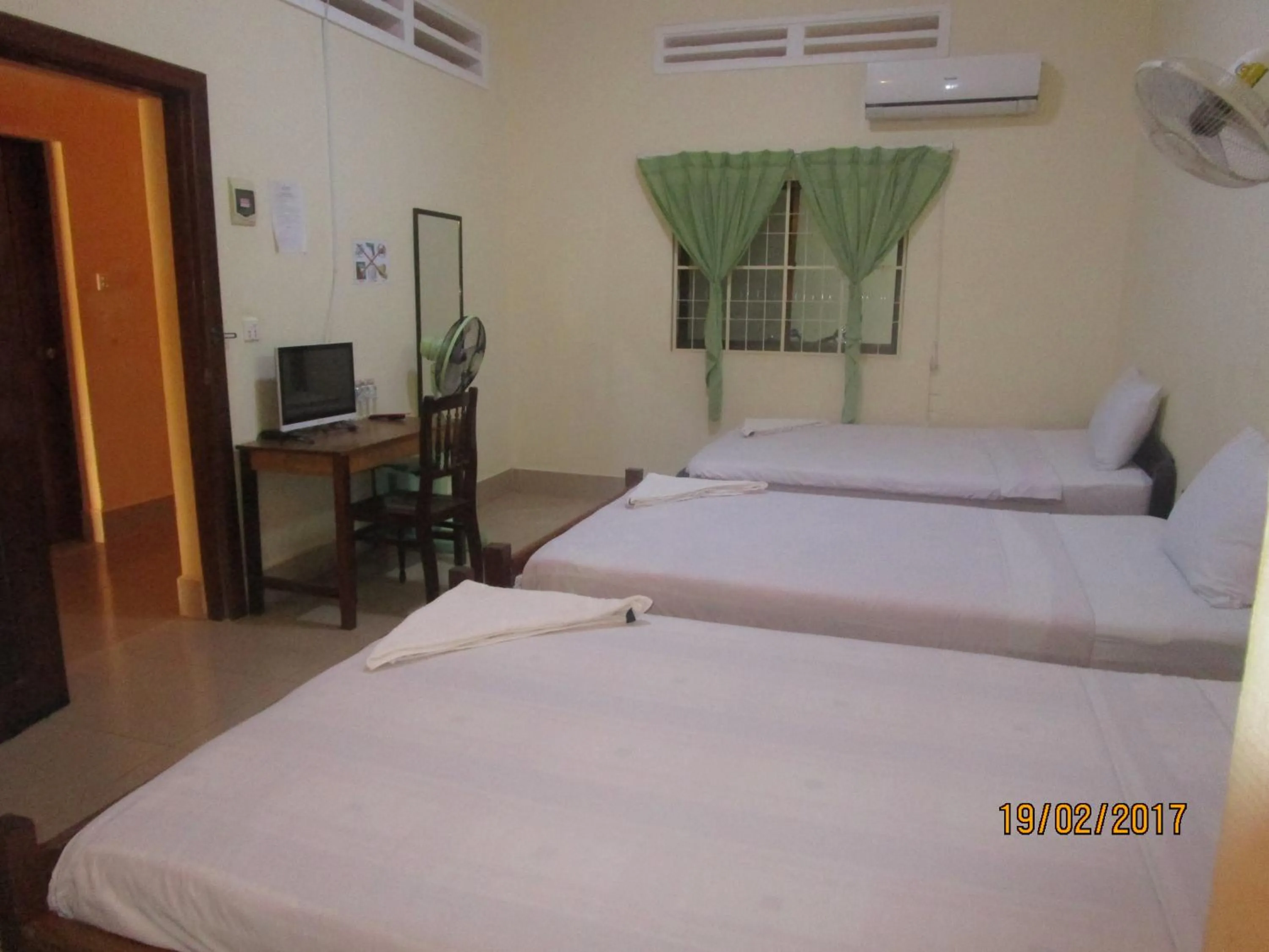 Bed in Visal Sak Guesthouse