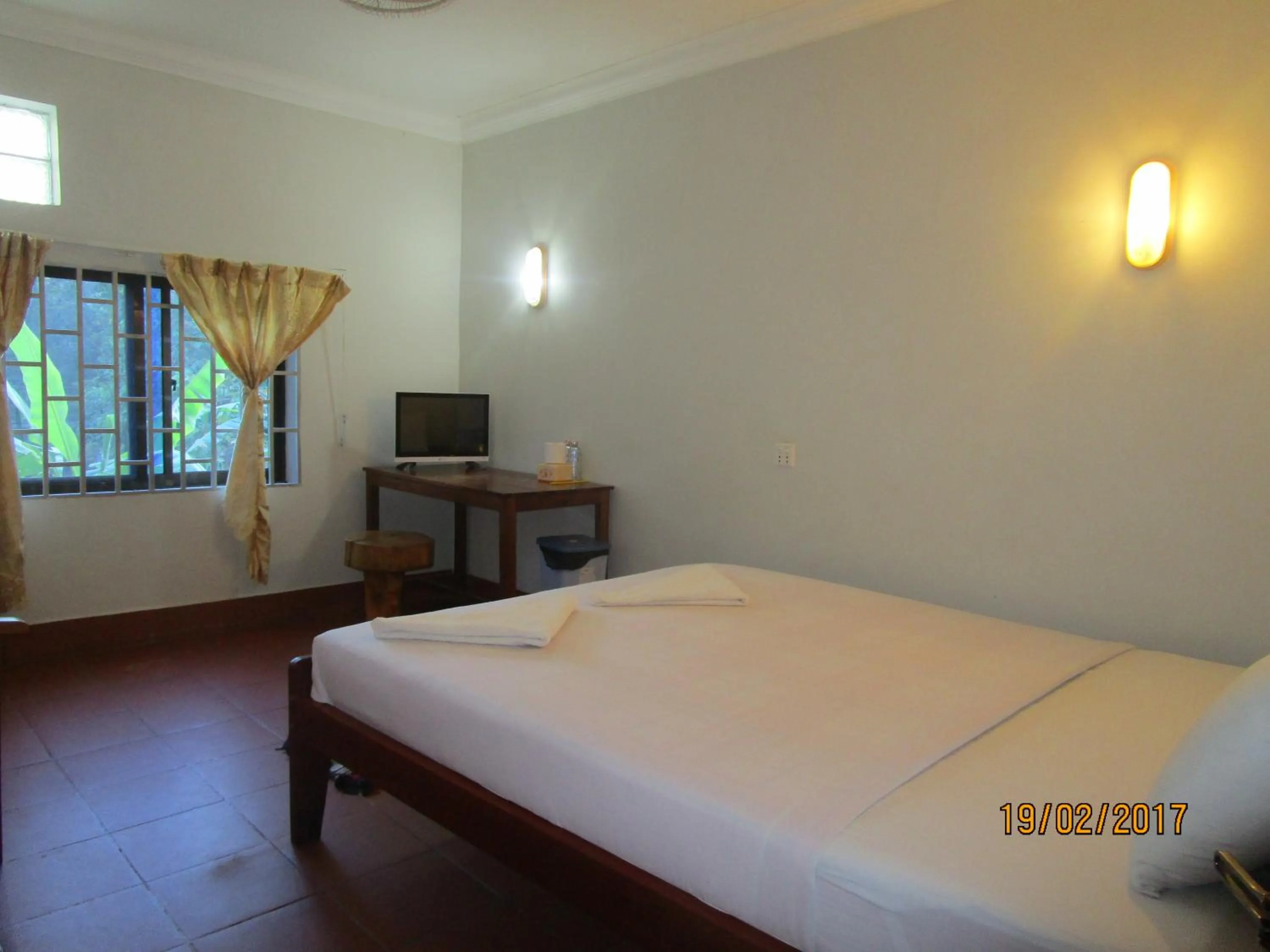 Bed in Visal Sak Guesthouse