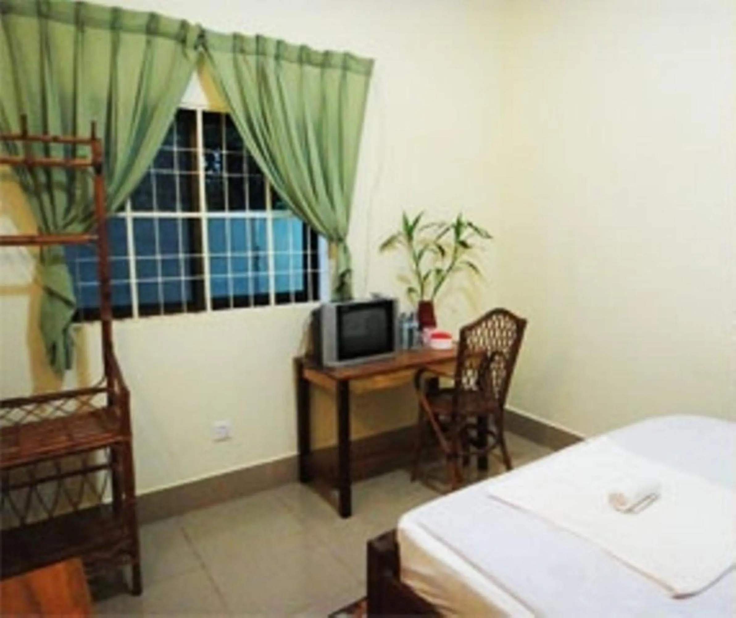 Bed in Visal Sak Guesthouse