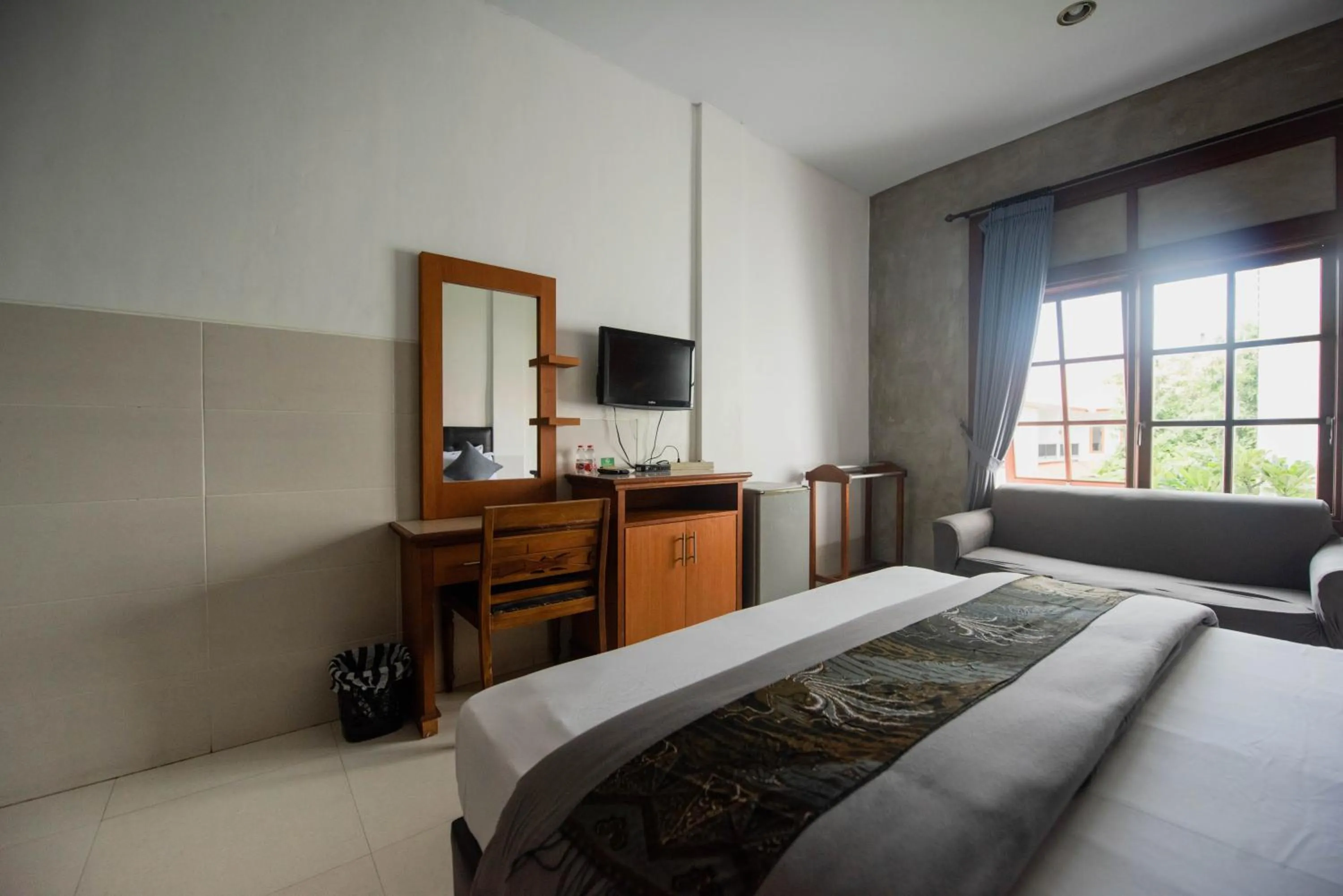 Bed in Sandat Hotel Legian