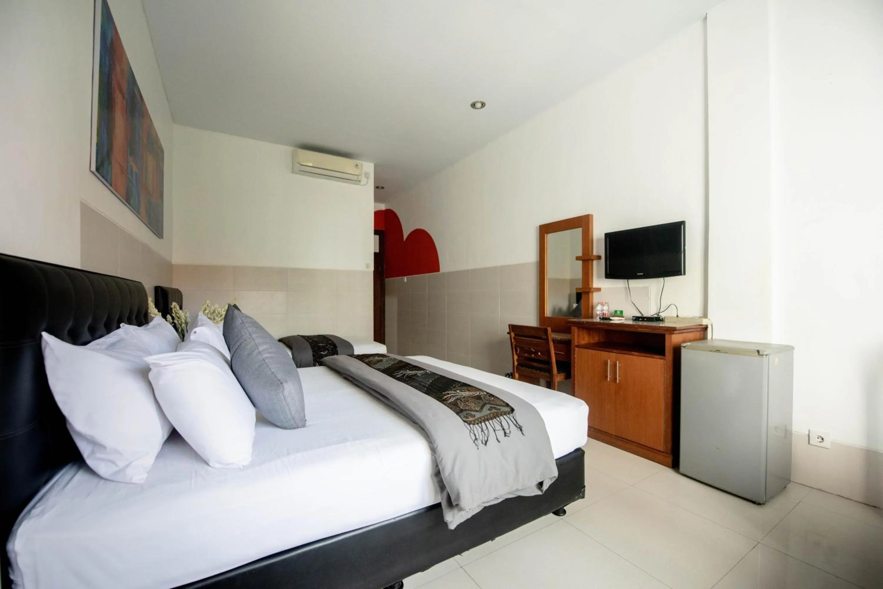 Bed in Sandat Hotel Legian