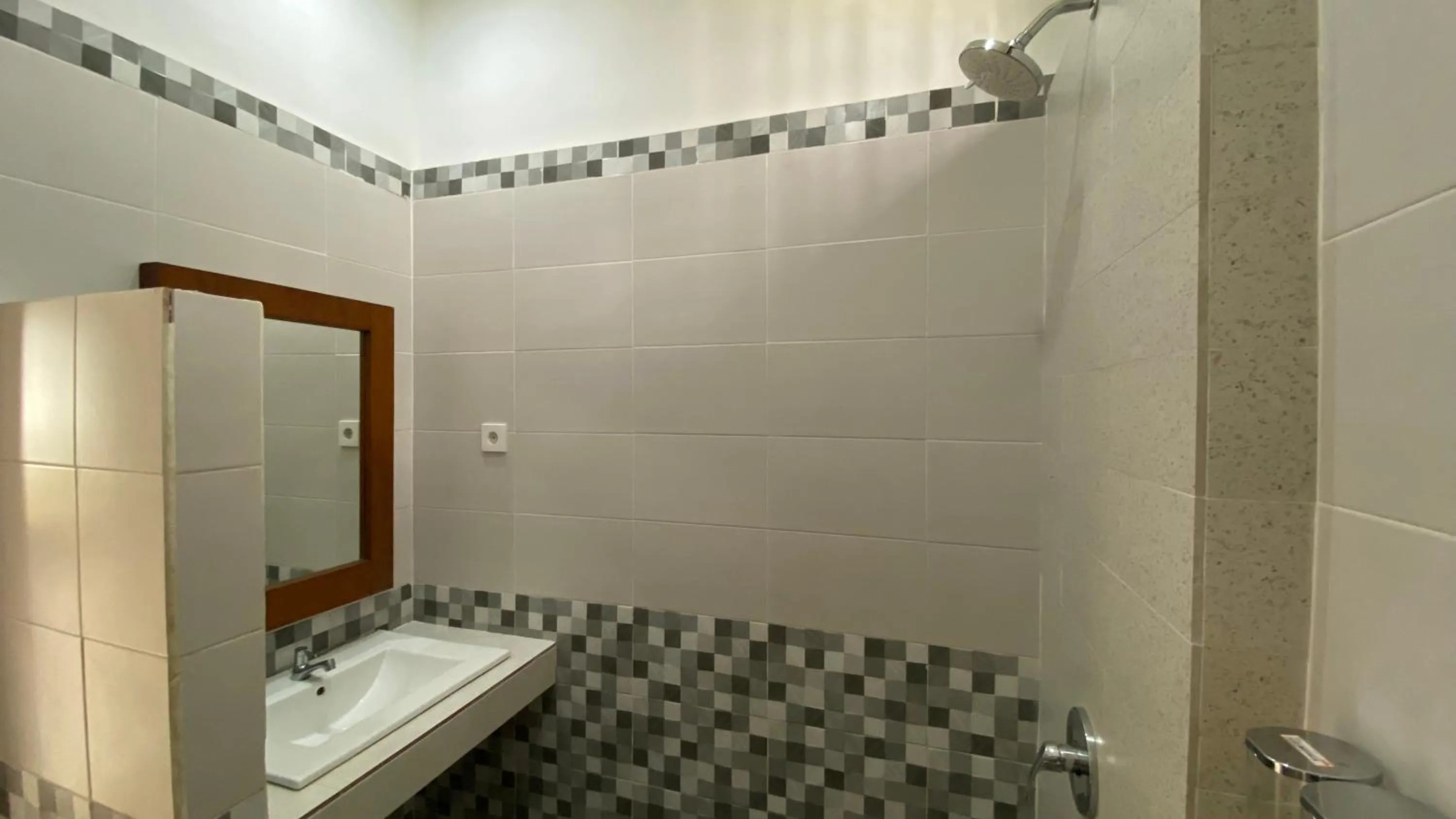 Bathroom in Sandat Hotel Legian