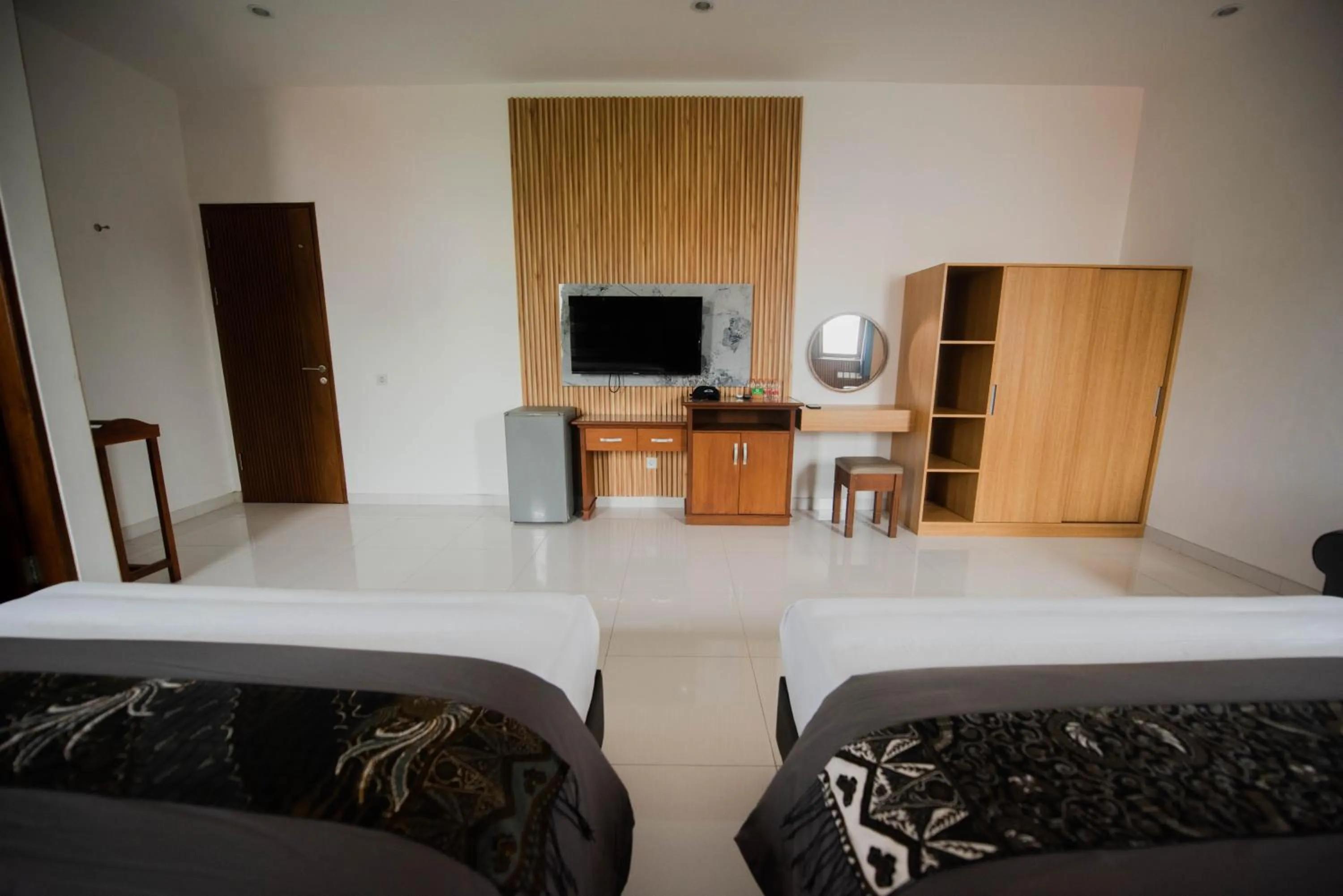 Bed in Sandat Hotel Legian