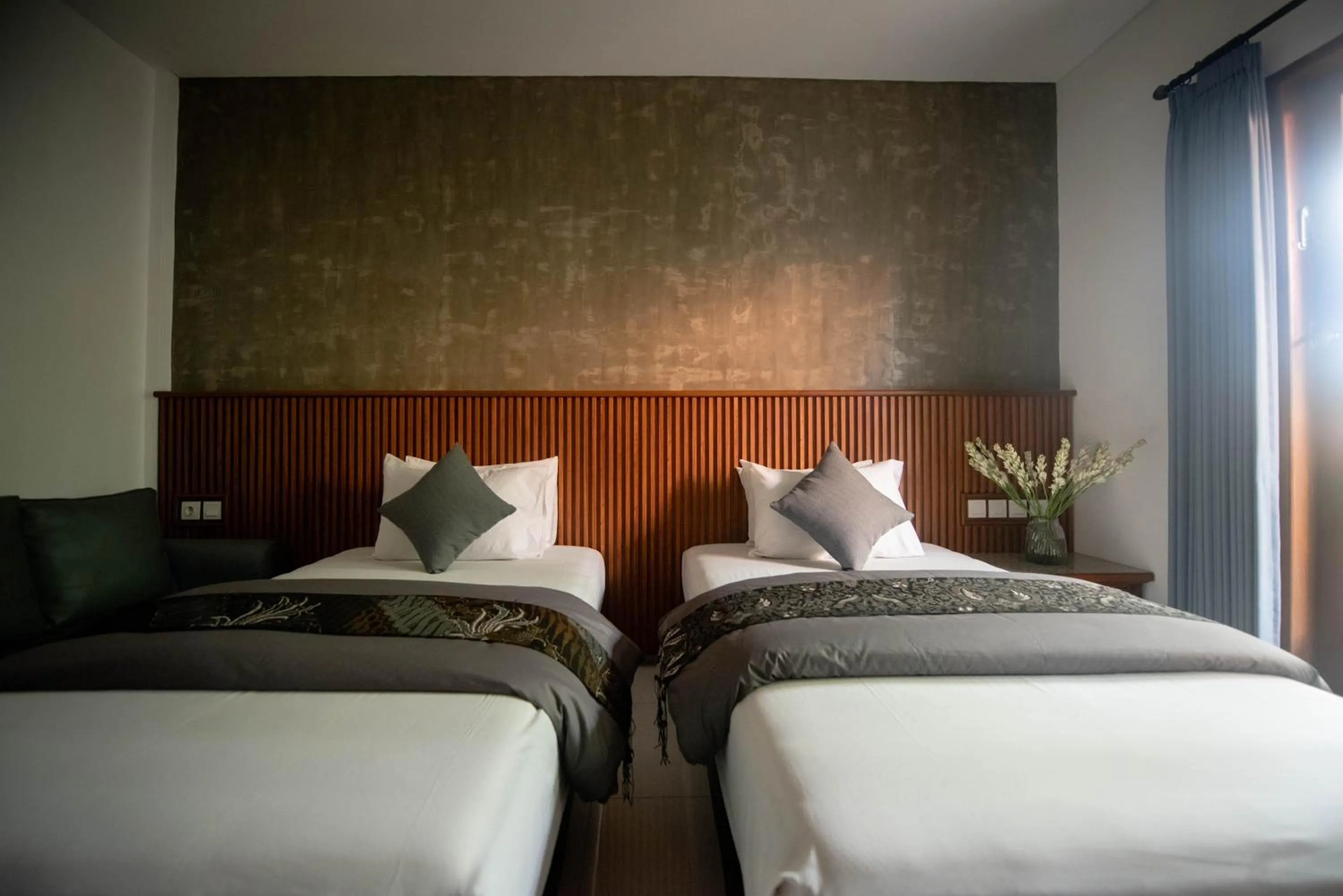 Bed in Sandat Hotel Legian