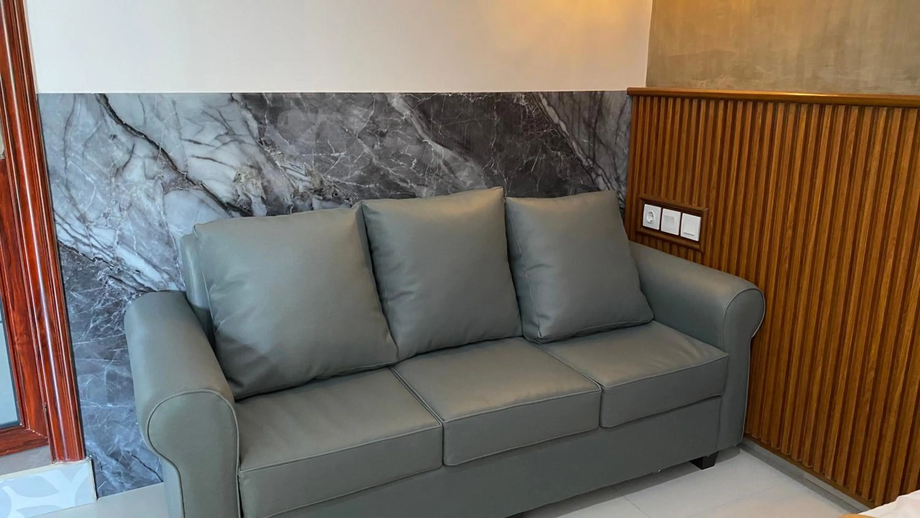 Seating area in Sandat Hotel Legian