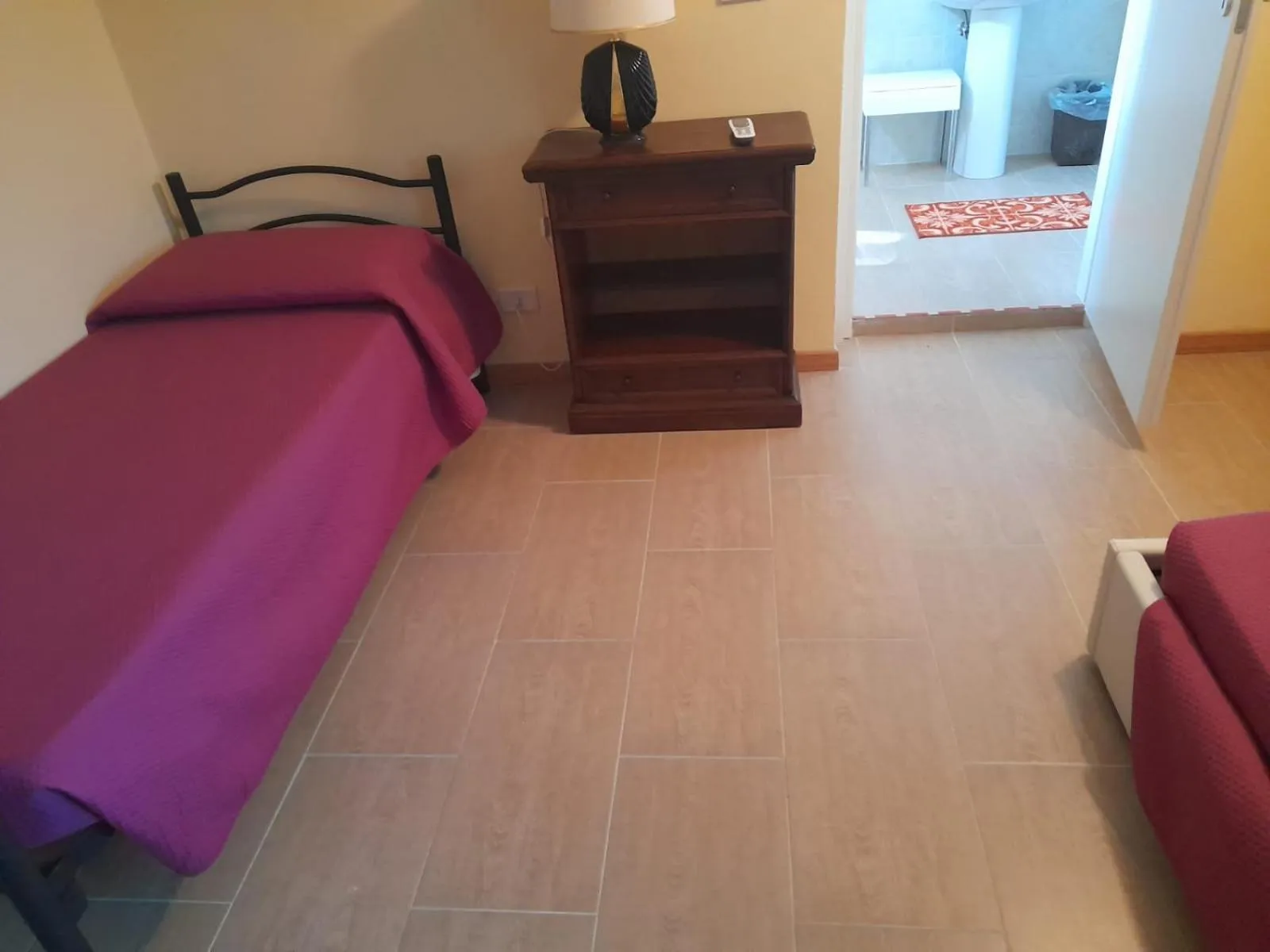 Bed in AGRITURISMO MELOGRANO D'ORO