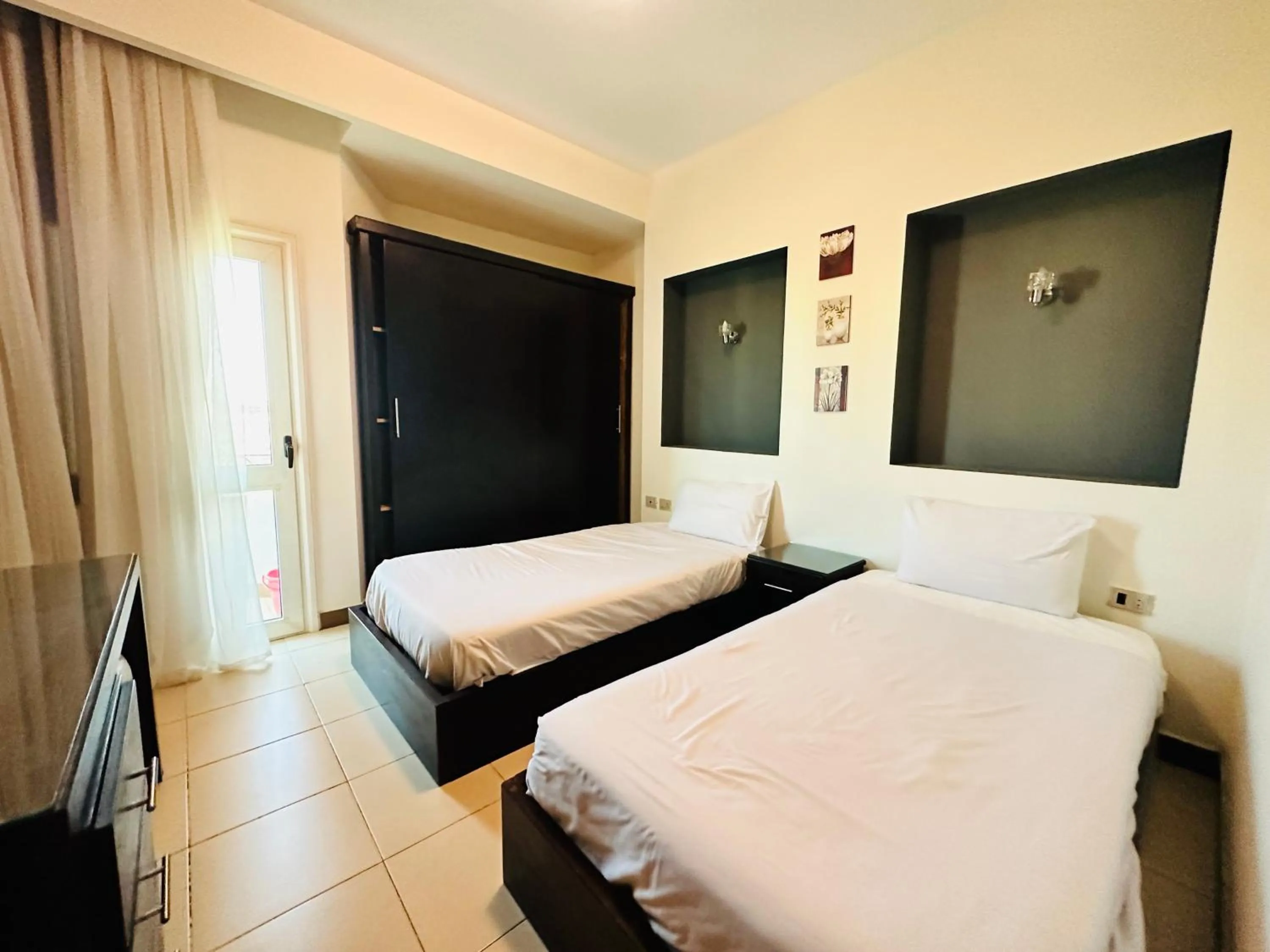 Bed in Elite Suites Hurghada