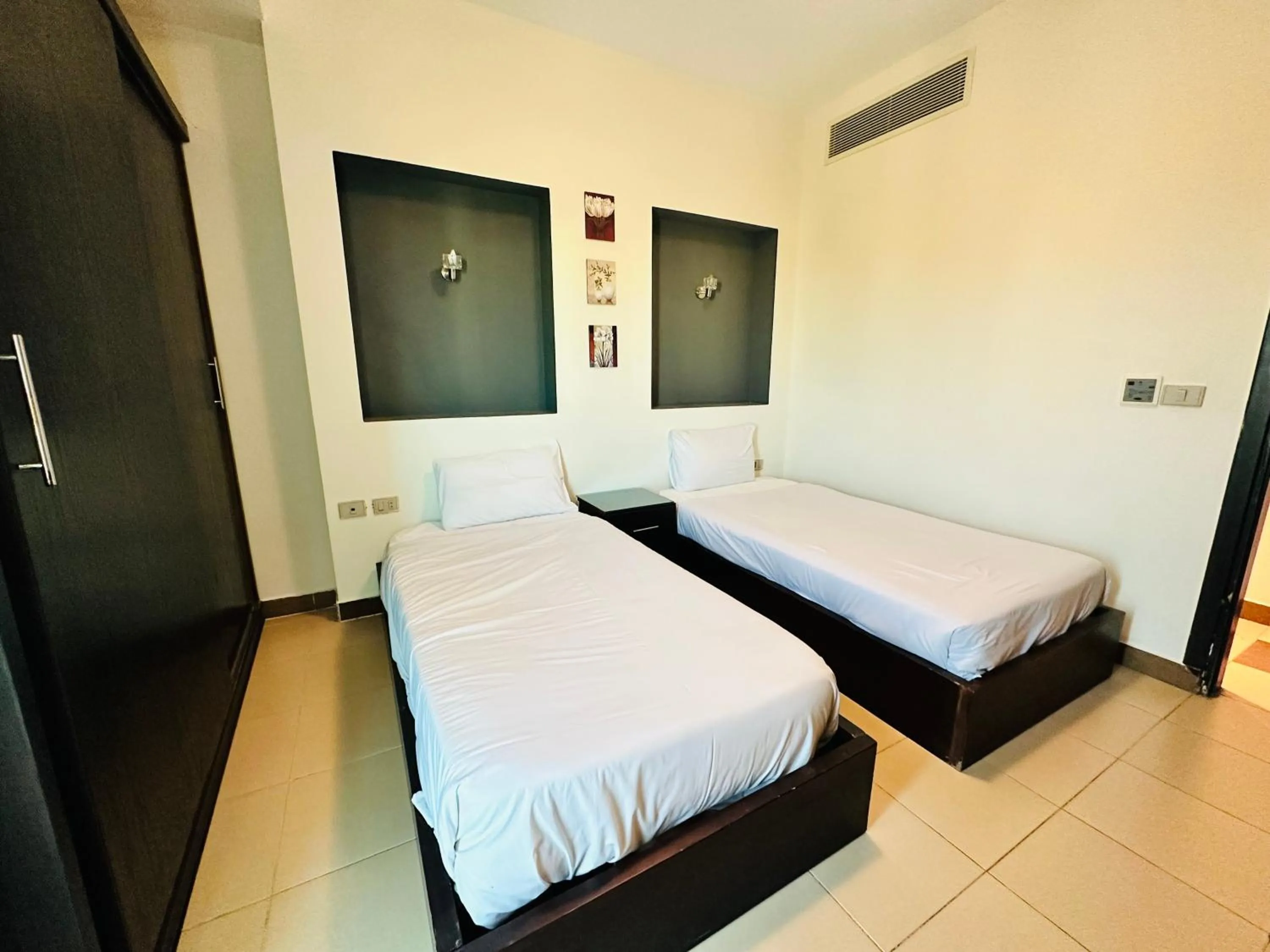 Bed in Elite Suites Hurghada