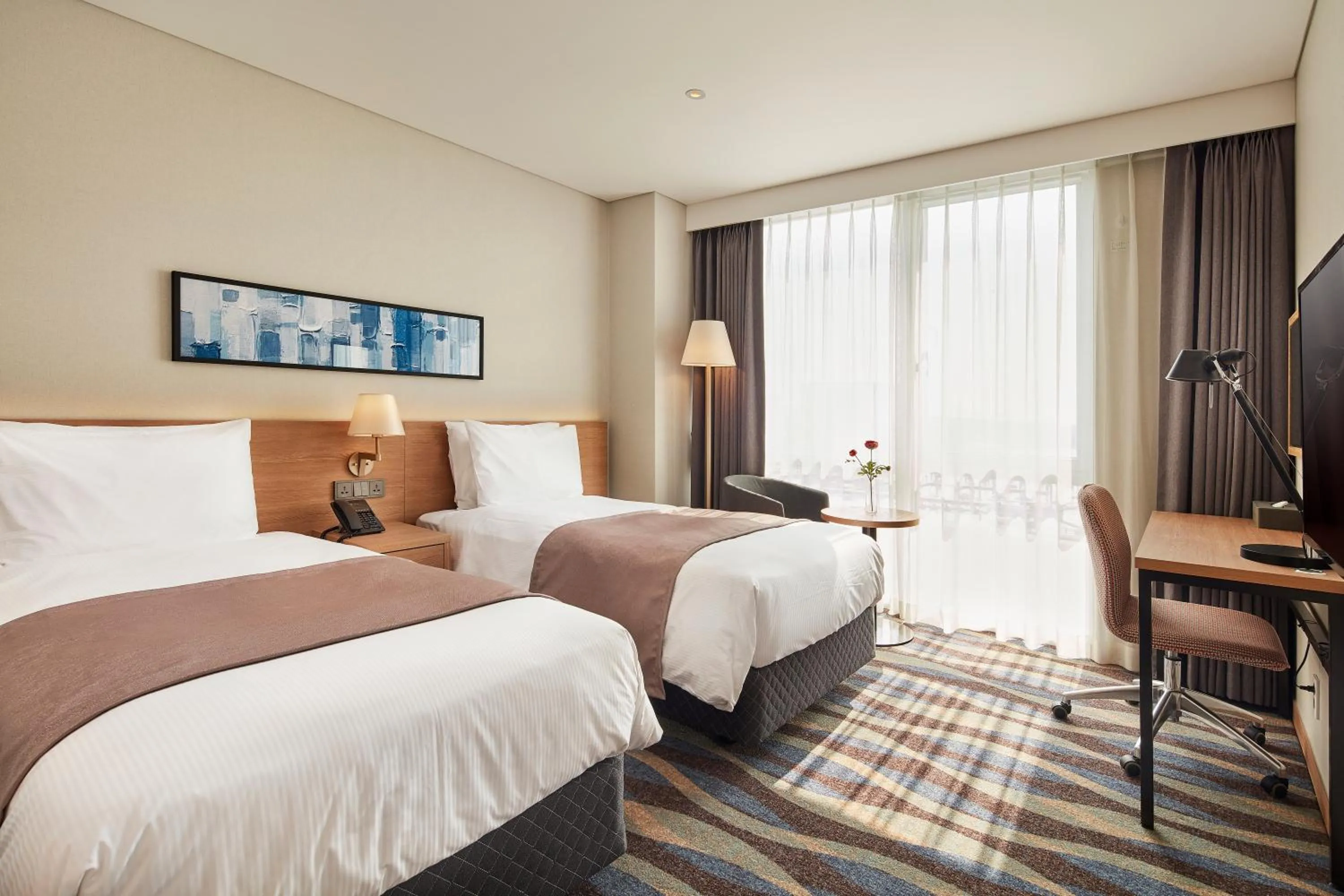 Photo of the whole room, Bed in Ramada Encore by Wyndham Gimpo Han River Hotel