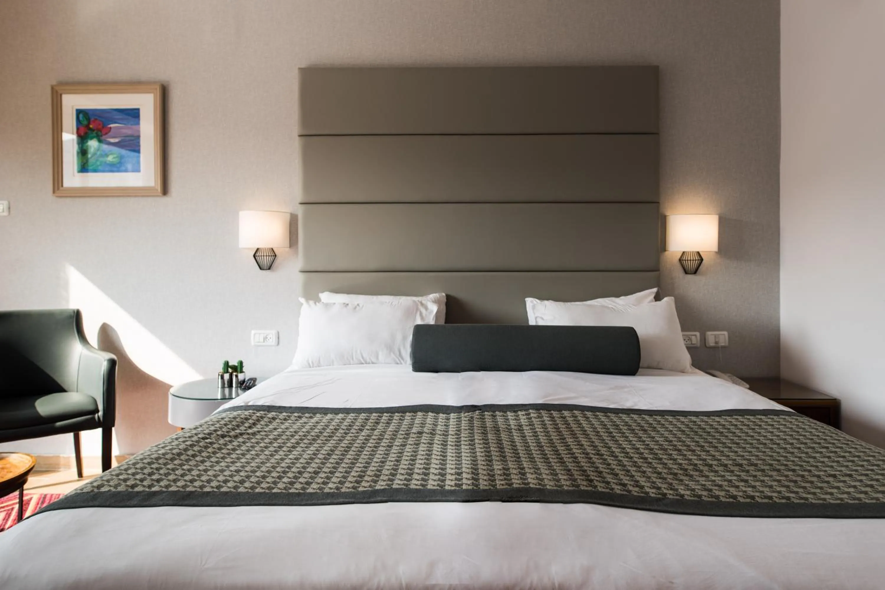 Bed in Astoria Galilee Hotel