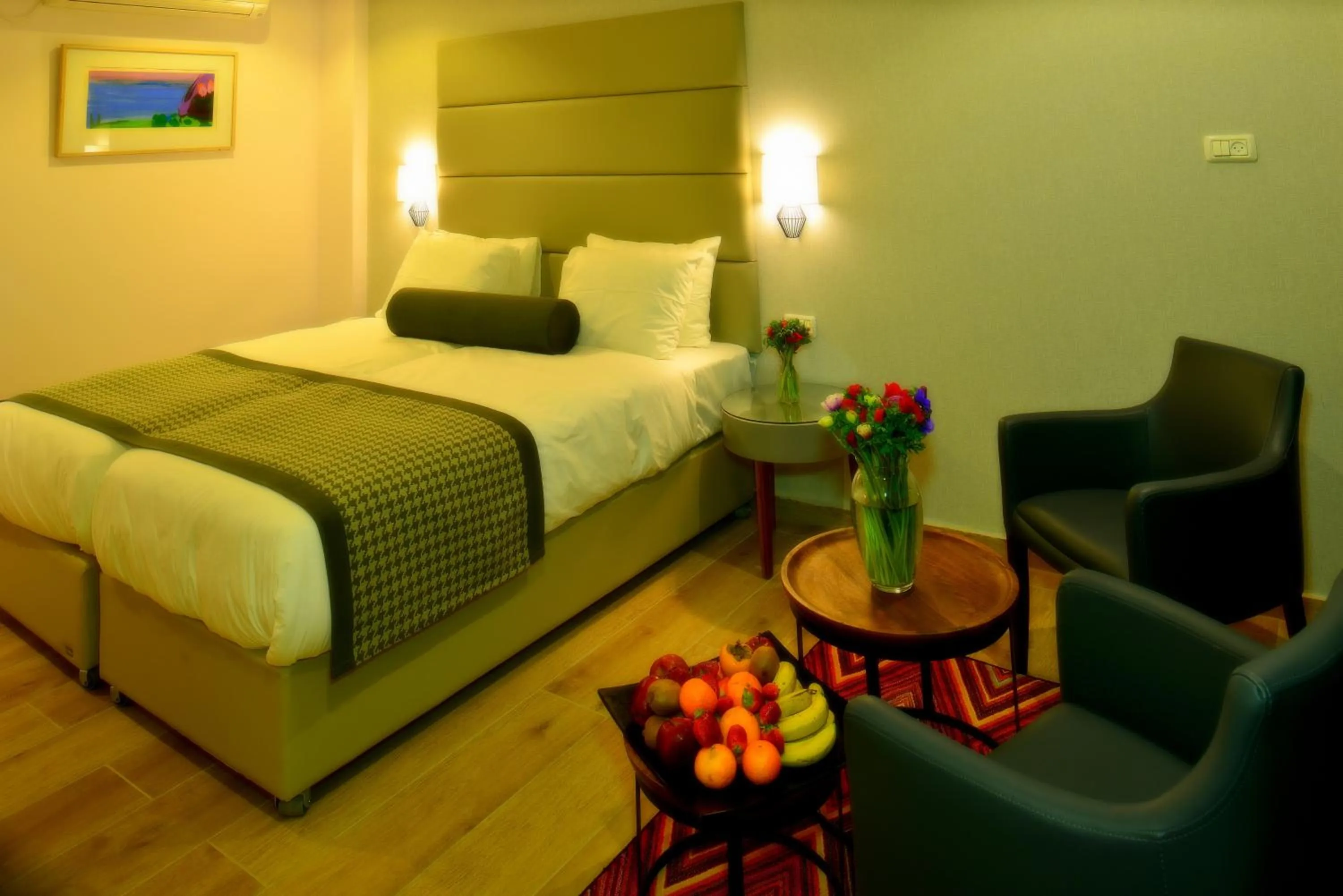 Dining area, Bed in Astoria Galilee Hotel