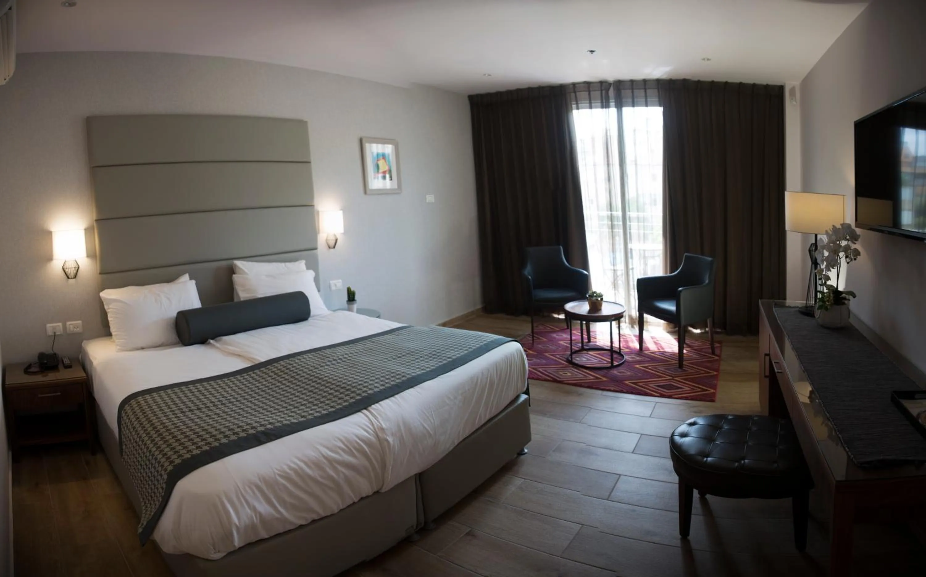 Photo of the whole room, Bed in Astoria Galilee Hotel