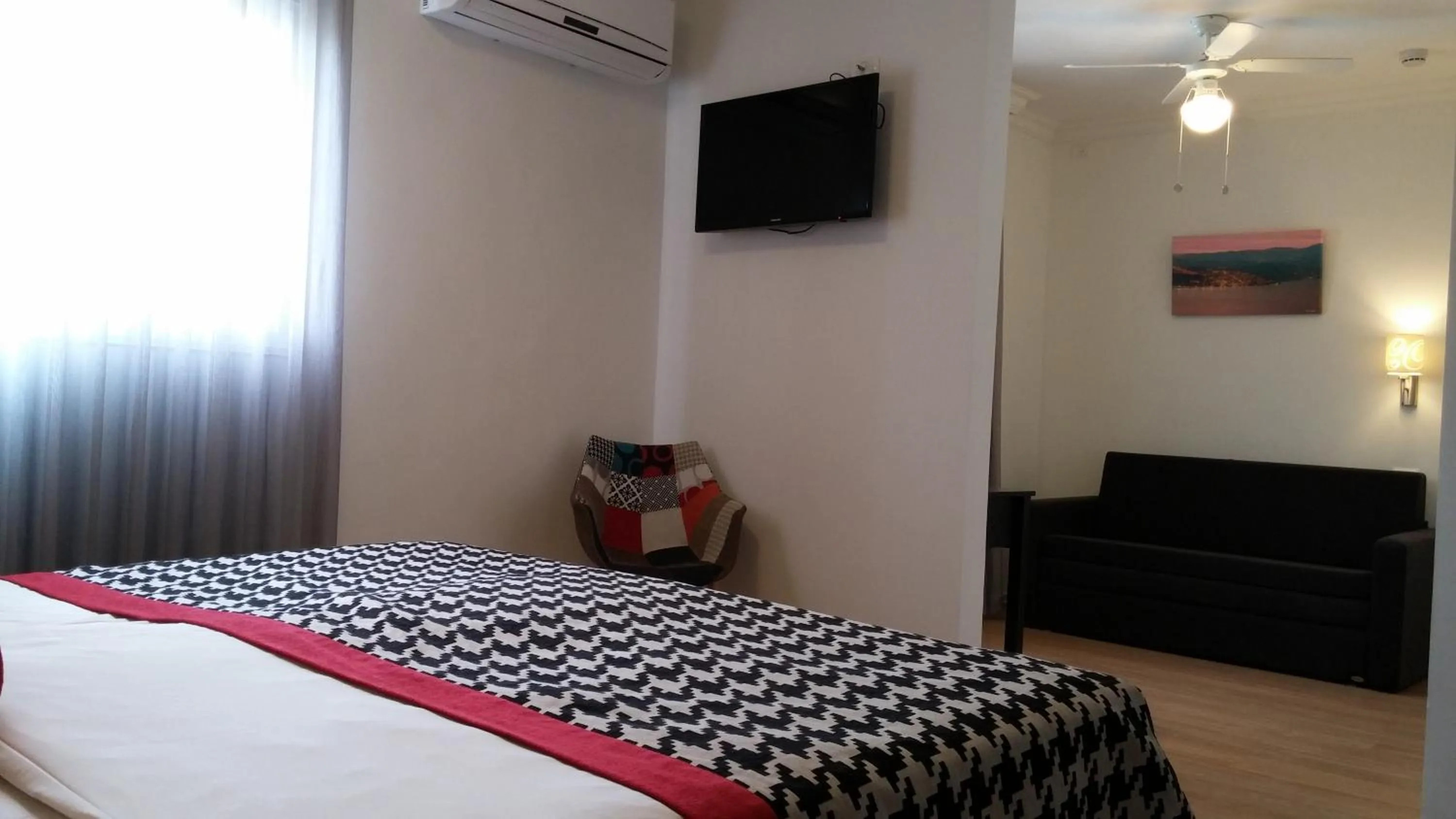 Photo of the whole room, Bed in Astoria Galilee Hotel