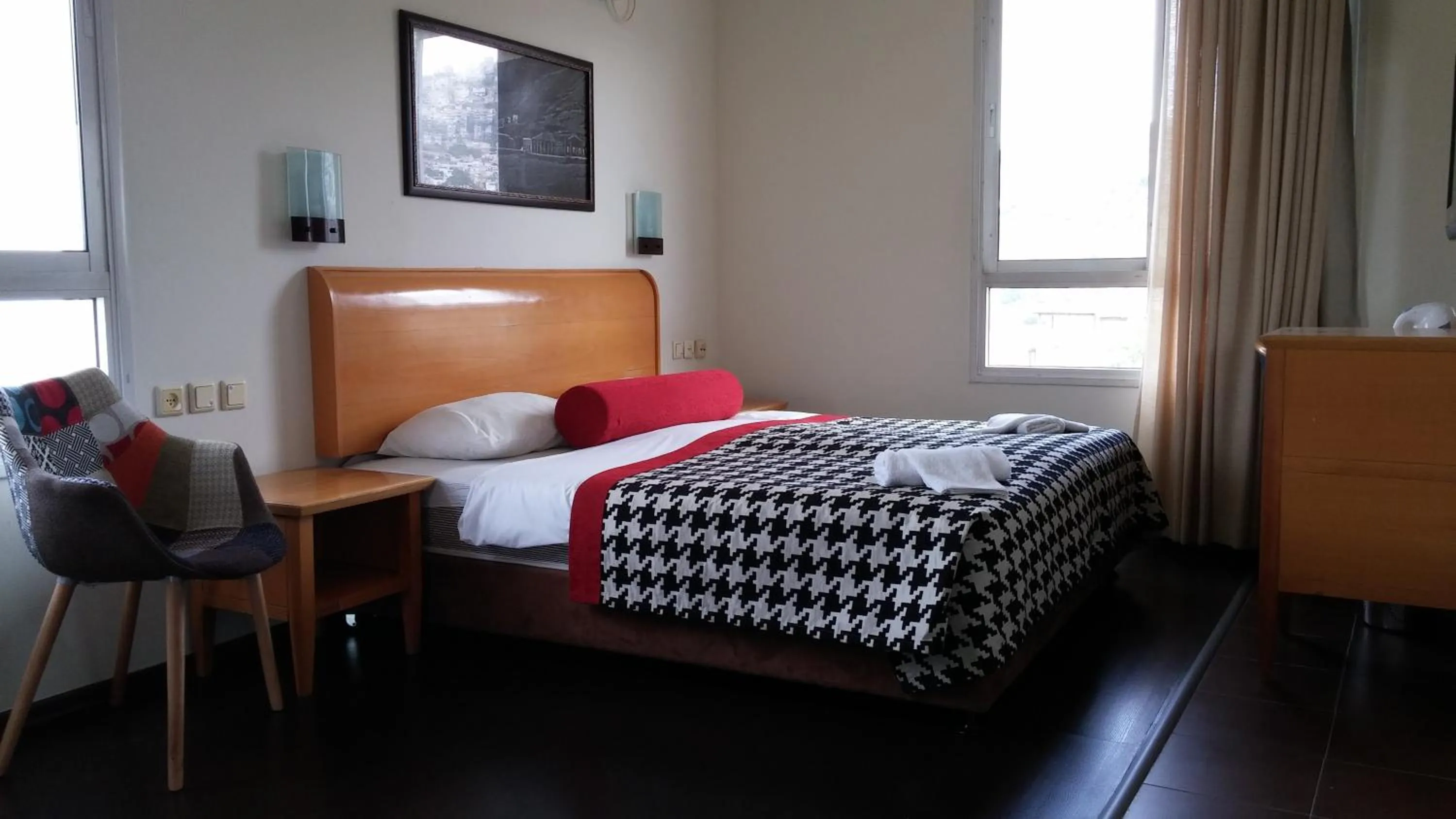 Photo of the whole room, Bed in Astoria Galilee Hotel