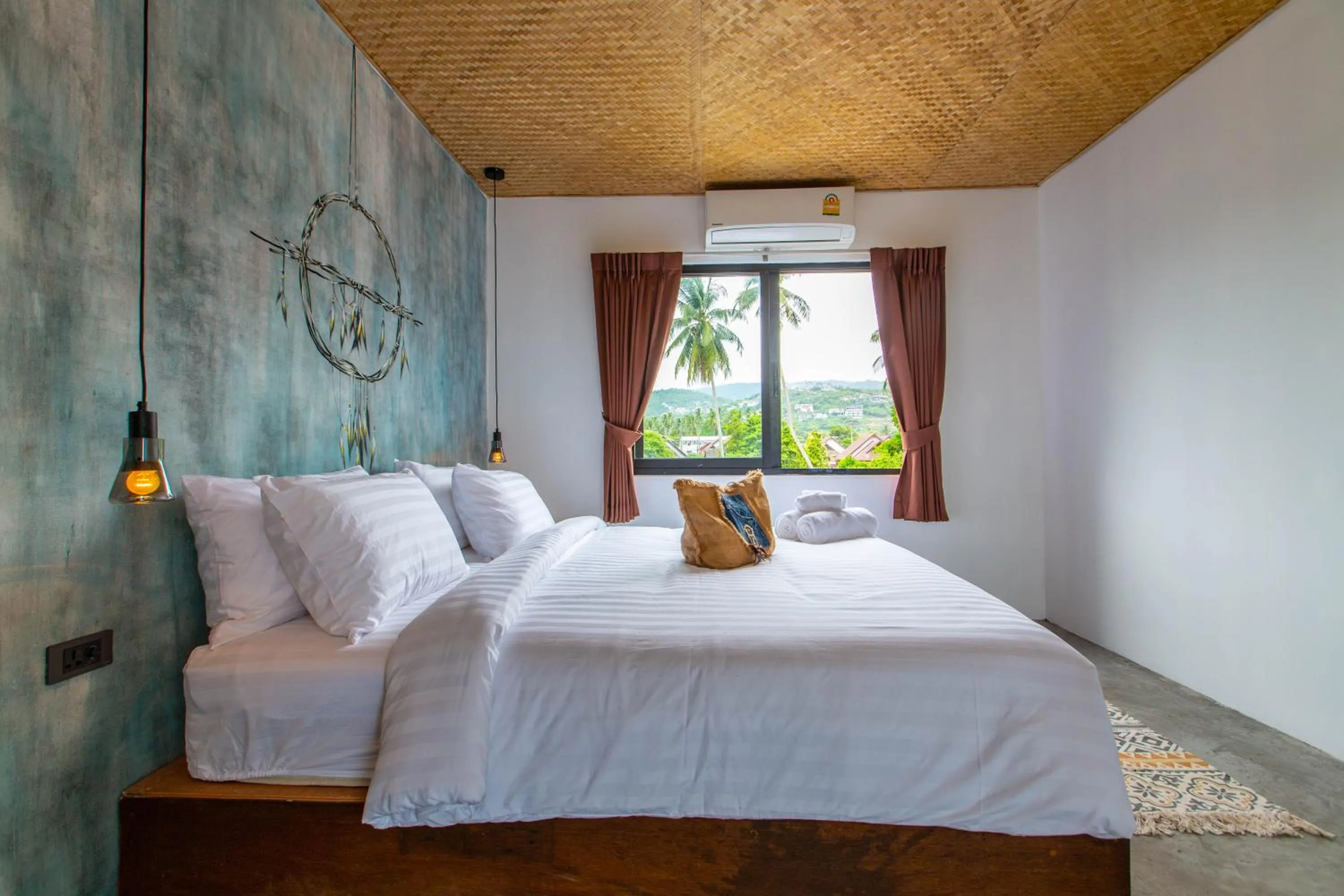 Bed in Dreamcatcher Boutique Hotel