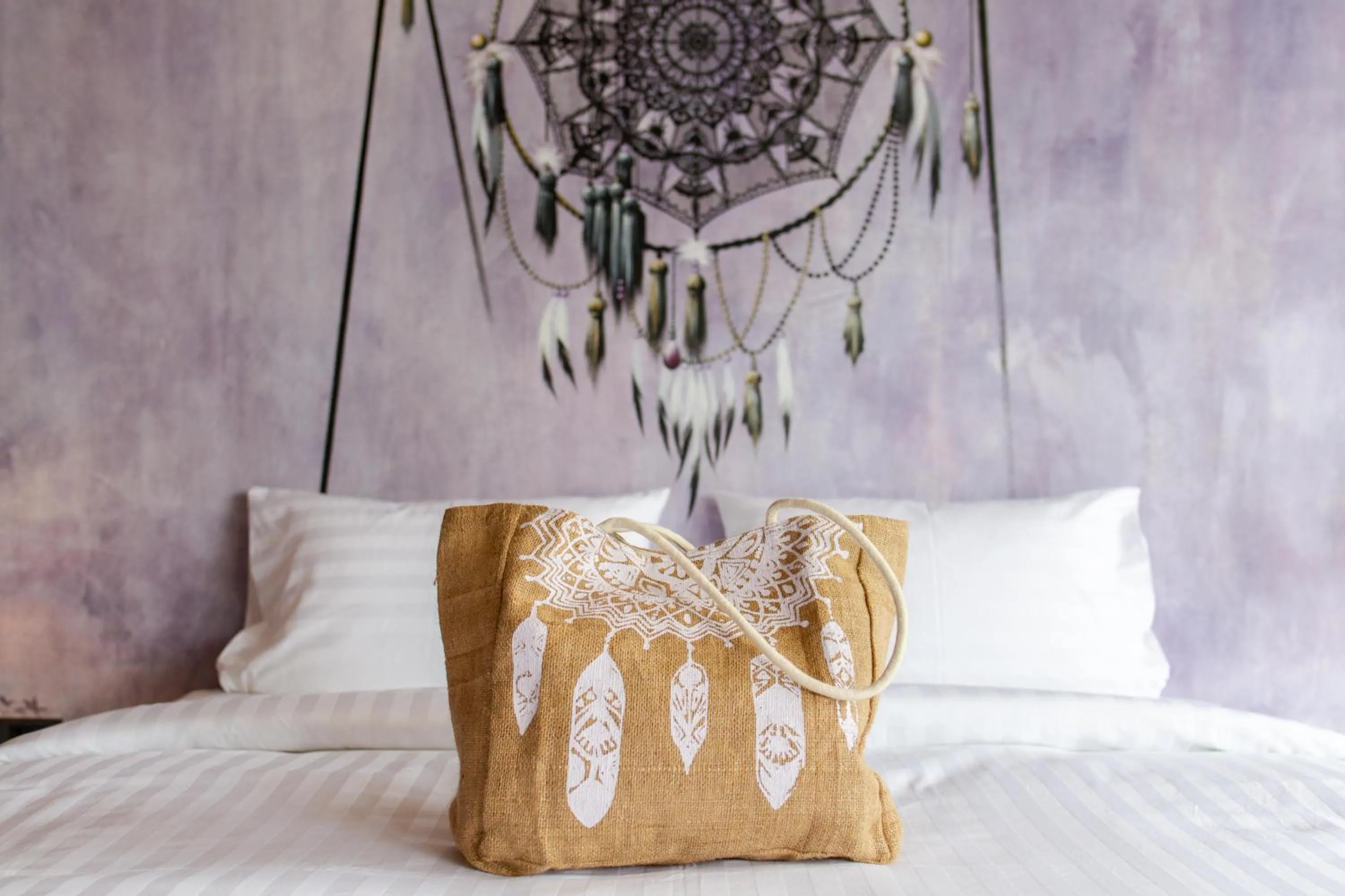 Bed in Dreamcatcher Boutique Hotel