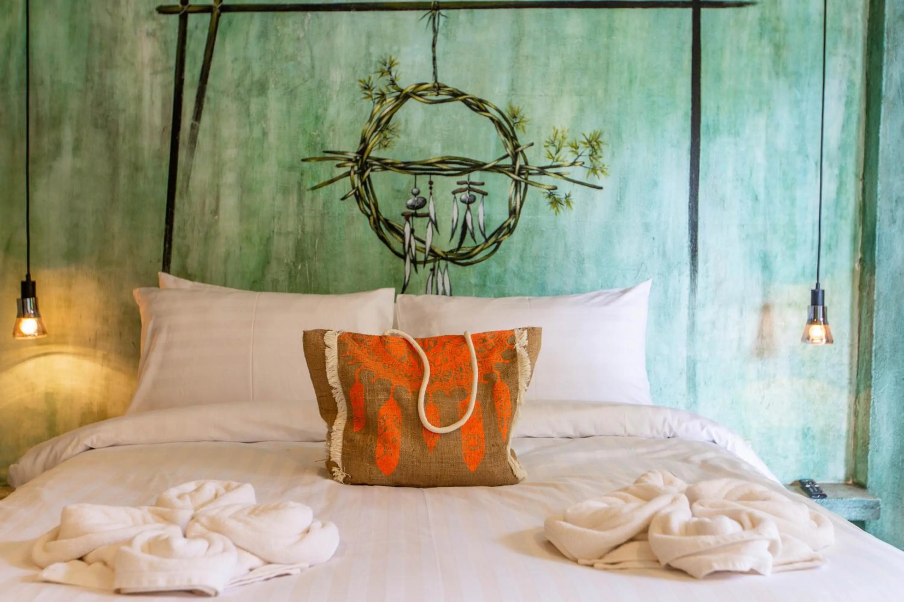 Bed in Dreamcatcher Boutique Hotel