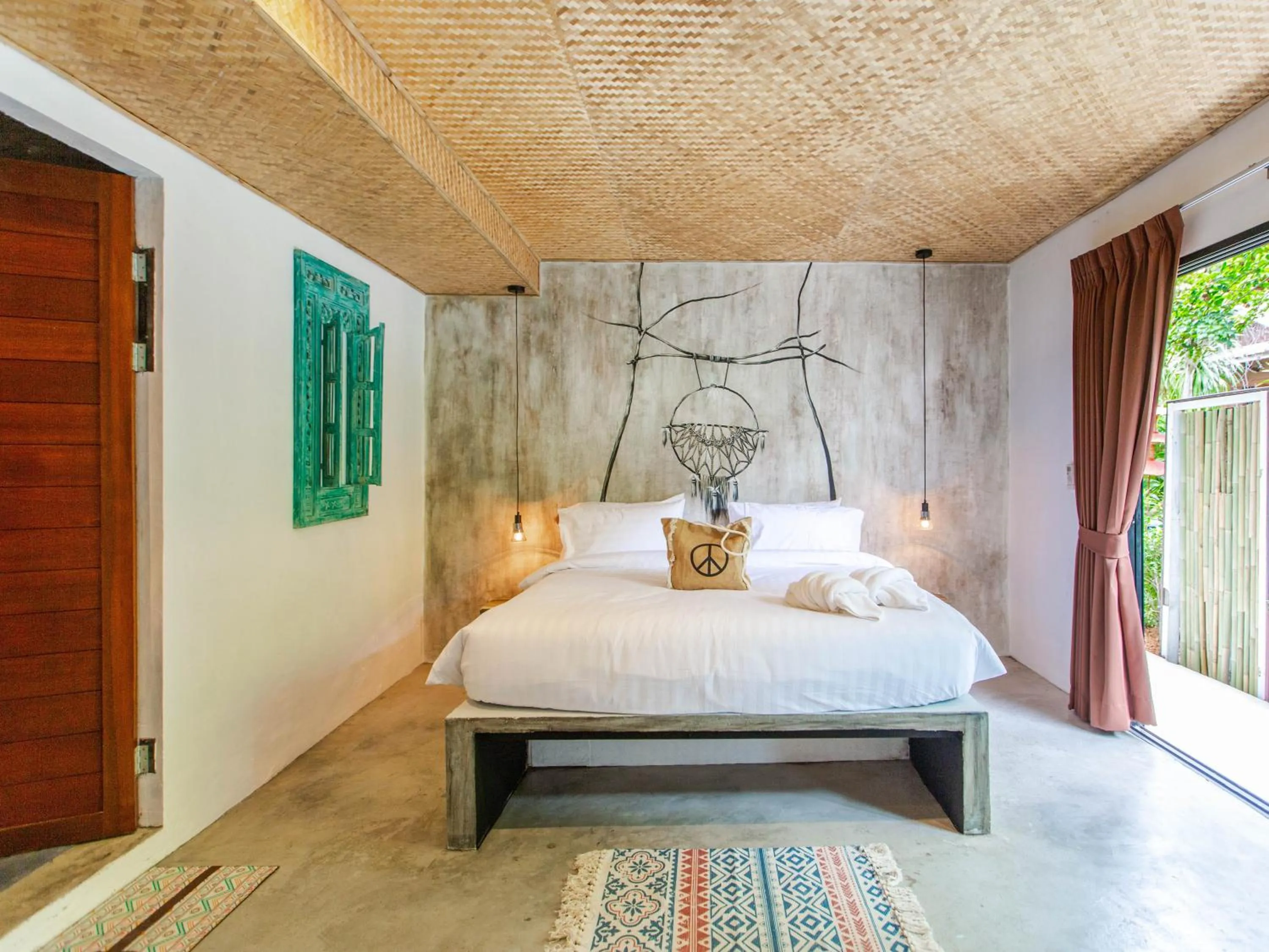 Bed in Dreamcatcher Boutique Hotel