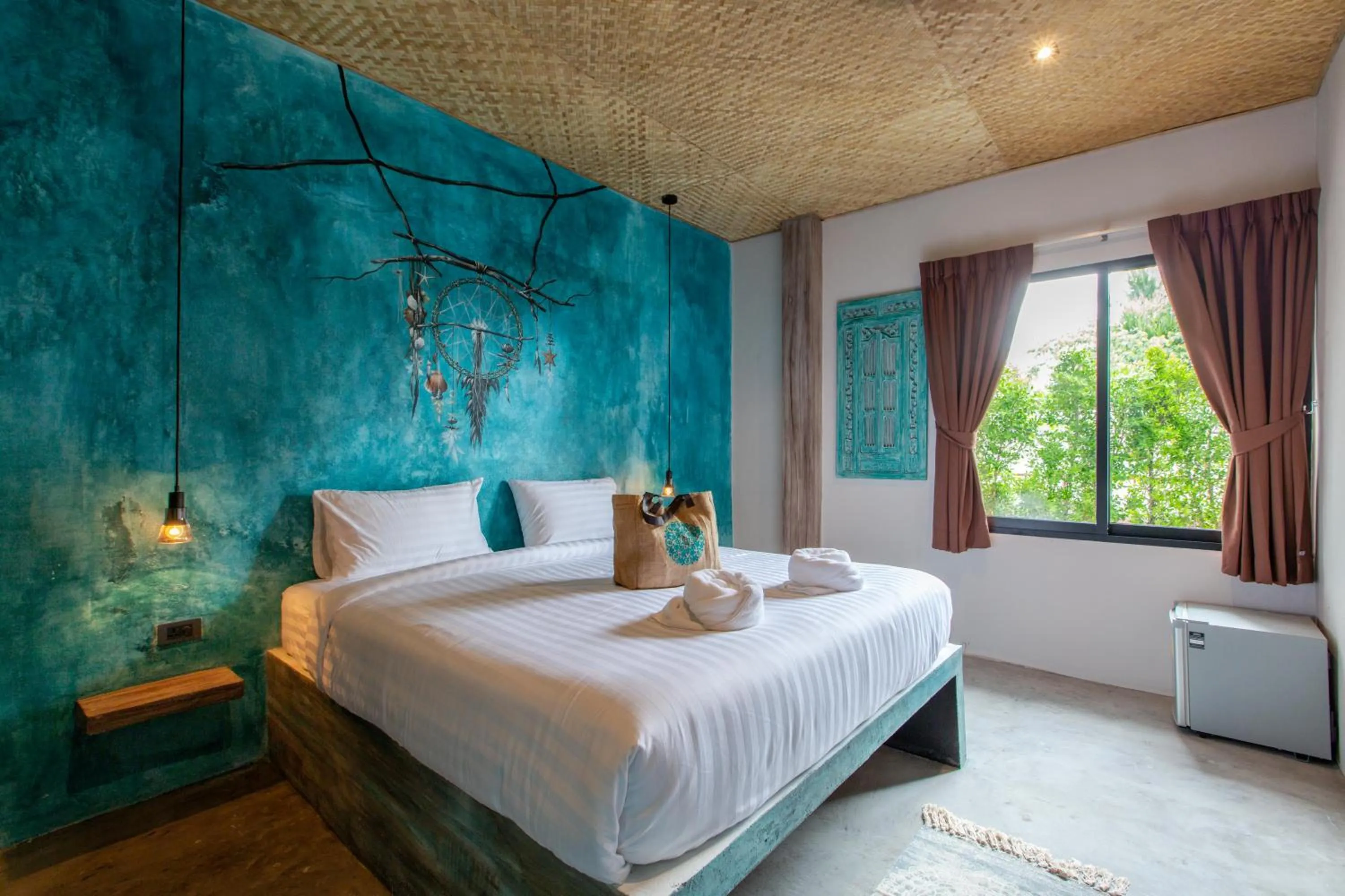 Bed in Dreamcatcher Boutique Hotel