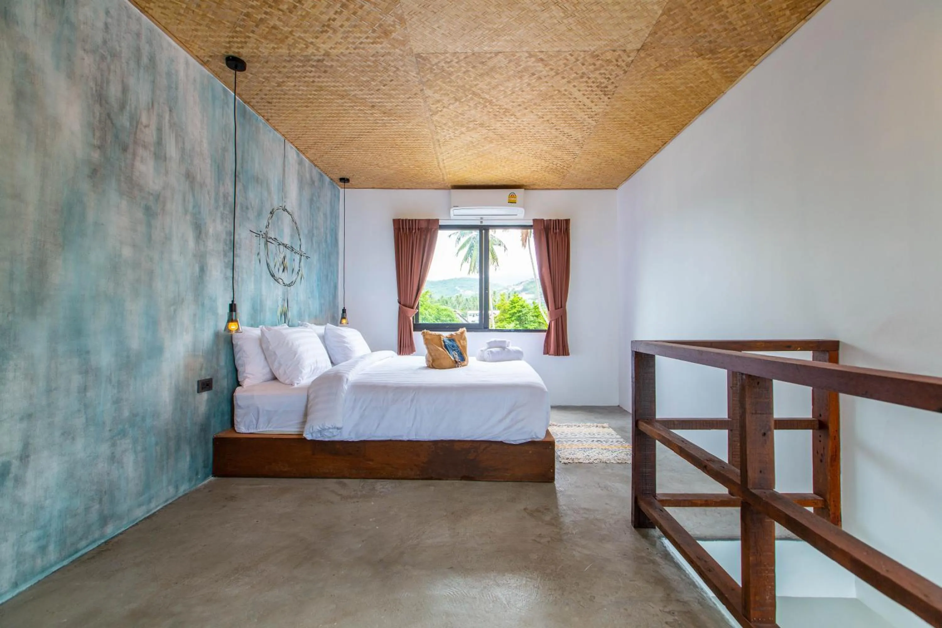 Bed in Dreamcatcher Boutique Hotel