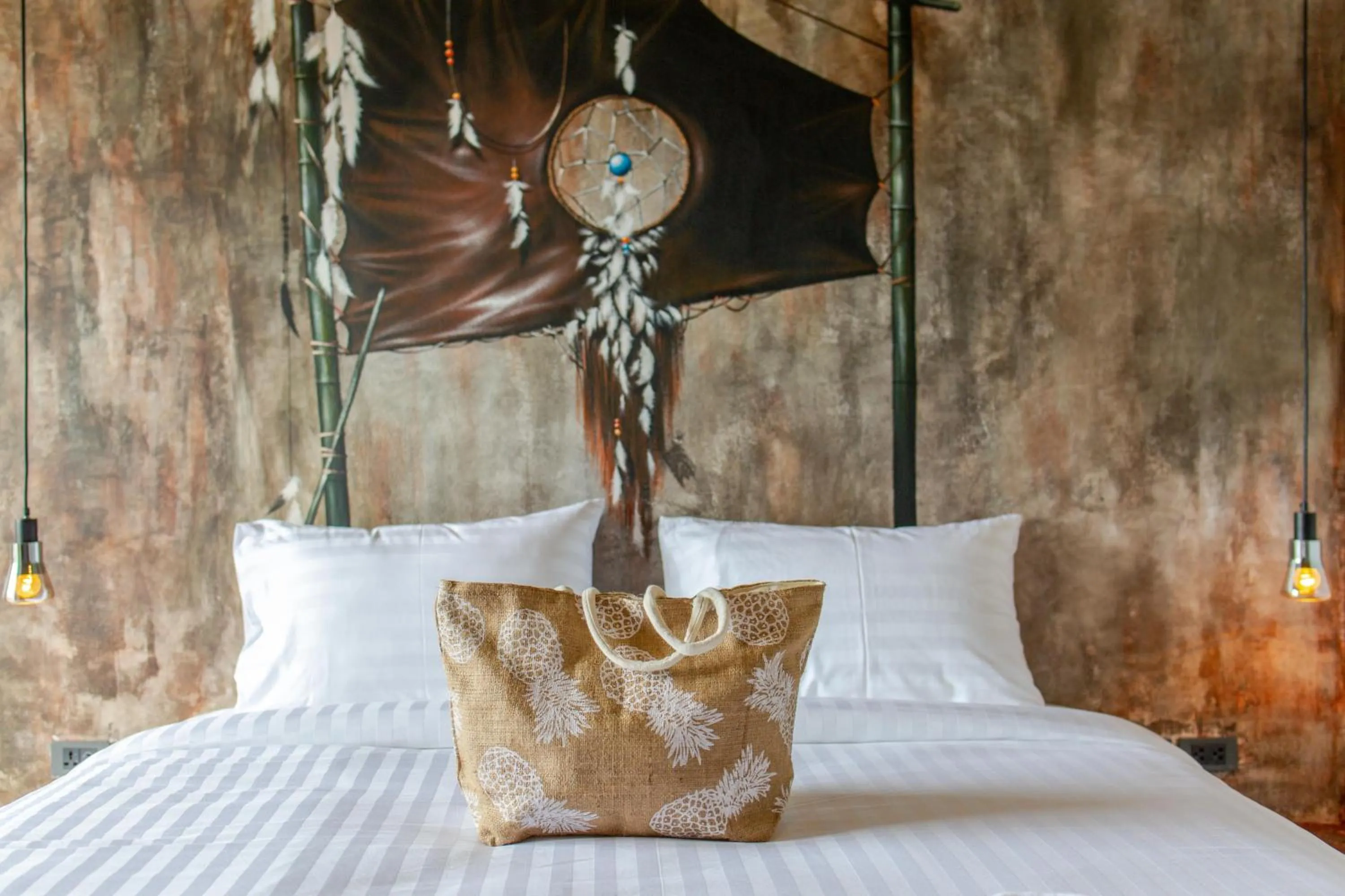 Bed in Dreamcatcher Boutique Hotel