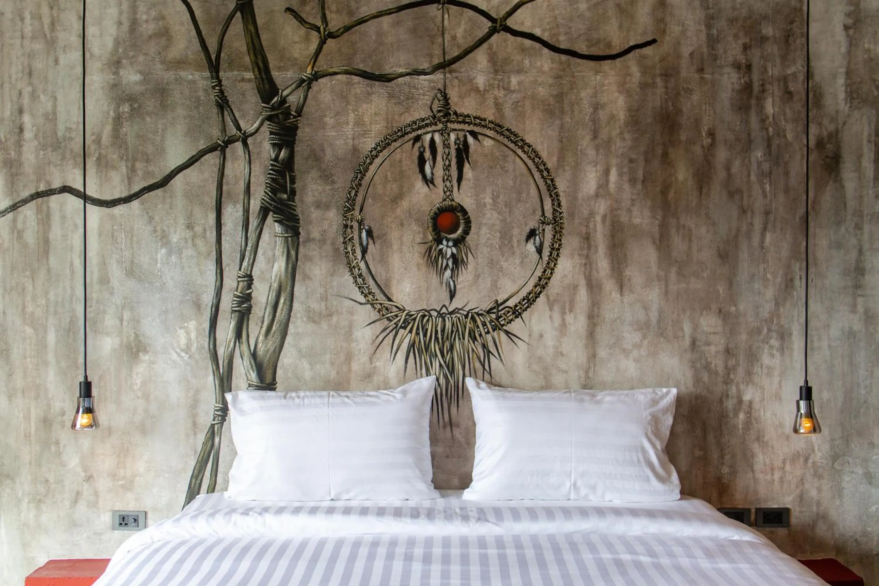Bed in Dreamcatcher Boutique Hotel